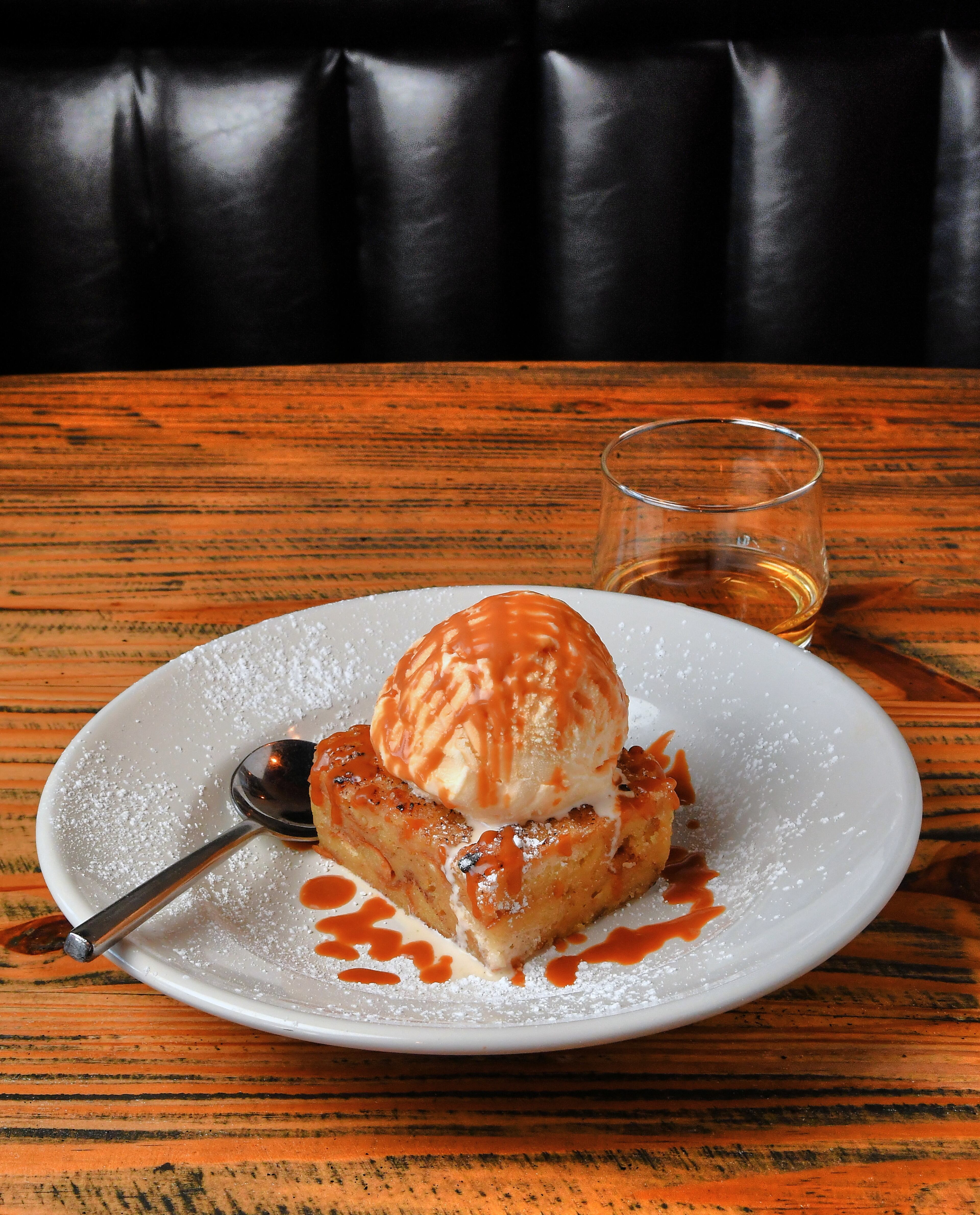 This Irish Bread Pudding is shown with Slane Irish Whiskey, which Wheelhouse Craft Pub and Kitchen in Decatur uses in the version at the pub. (Styling by Ian Macken / Chris Hunt for the AJC)