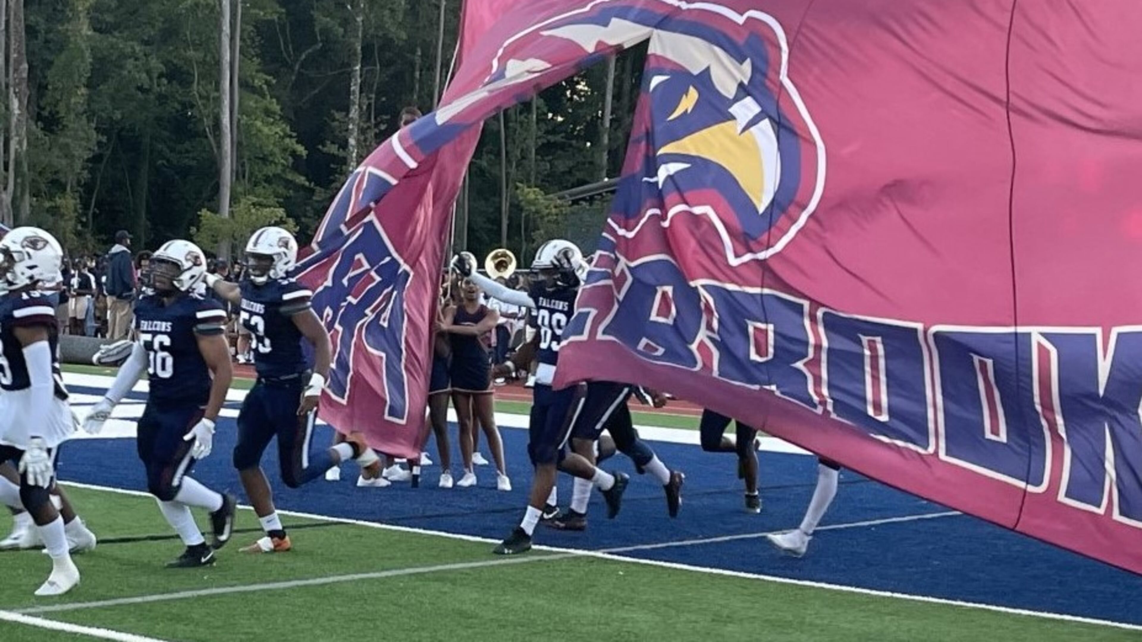 Pebblebrook players take the field before their game against North Atlanta in Mableton on Sept. 24, 2021. (Photo by Chip Saye)