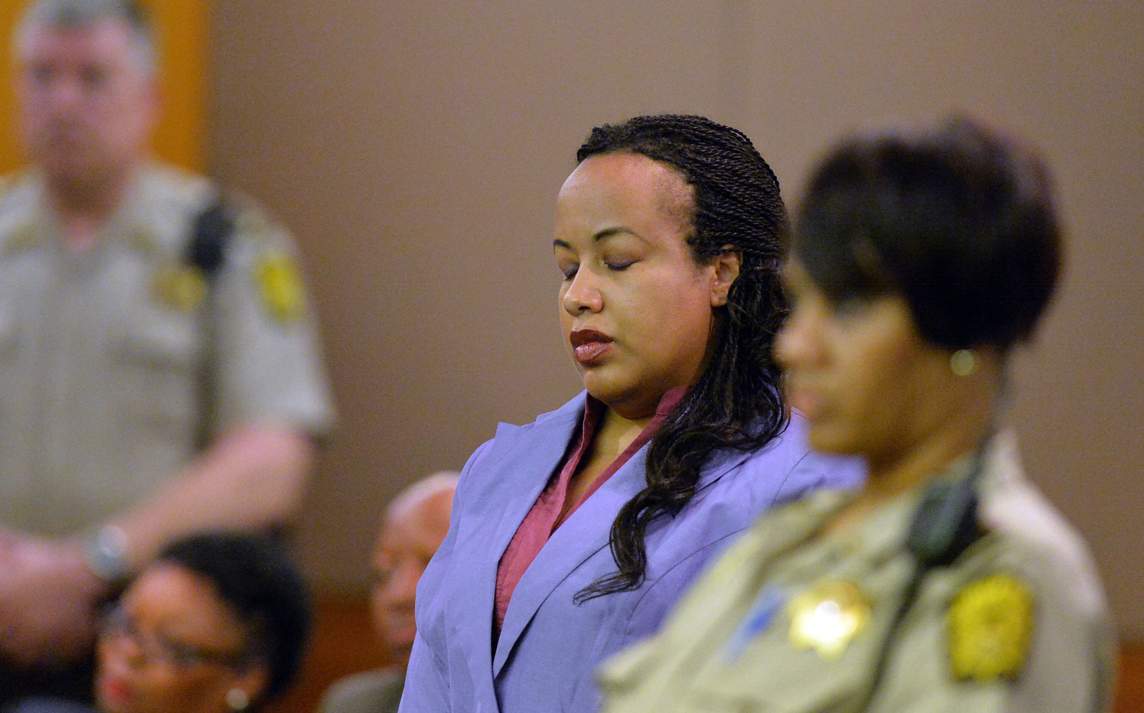 Defense attorney Annette Greene reacts as the verdict convicting her client, former APS Dunbar Elementary teacher Shani Robinson, of Violation of Racketeer Influenced and Corrupt Organizations Act charges is read in court Wednesday. Robinson was excused from court because she is due to give birth soon. A jury of six men and six women rendered their verdicts on the eighth day of deliberations in the Atlanta Public Schools test-cheating trial on Wednesday, April 1, 2015. Jurors sorted through roughly five months of testimony against 12 former educators accused of engaging in a racketeering conspiracy to inflate test scores. (Atlanta Journal-Constitution, Kent D. Johnson, Pool)