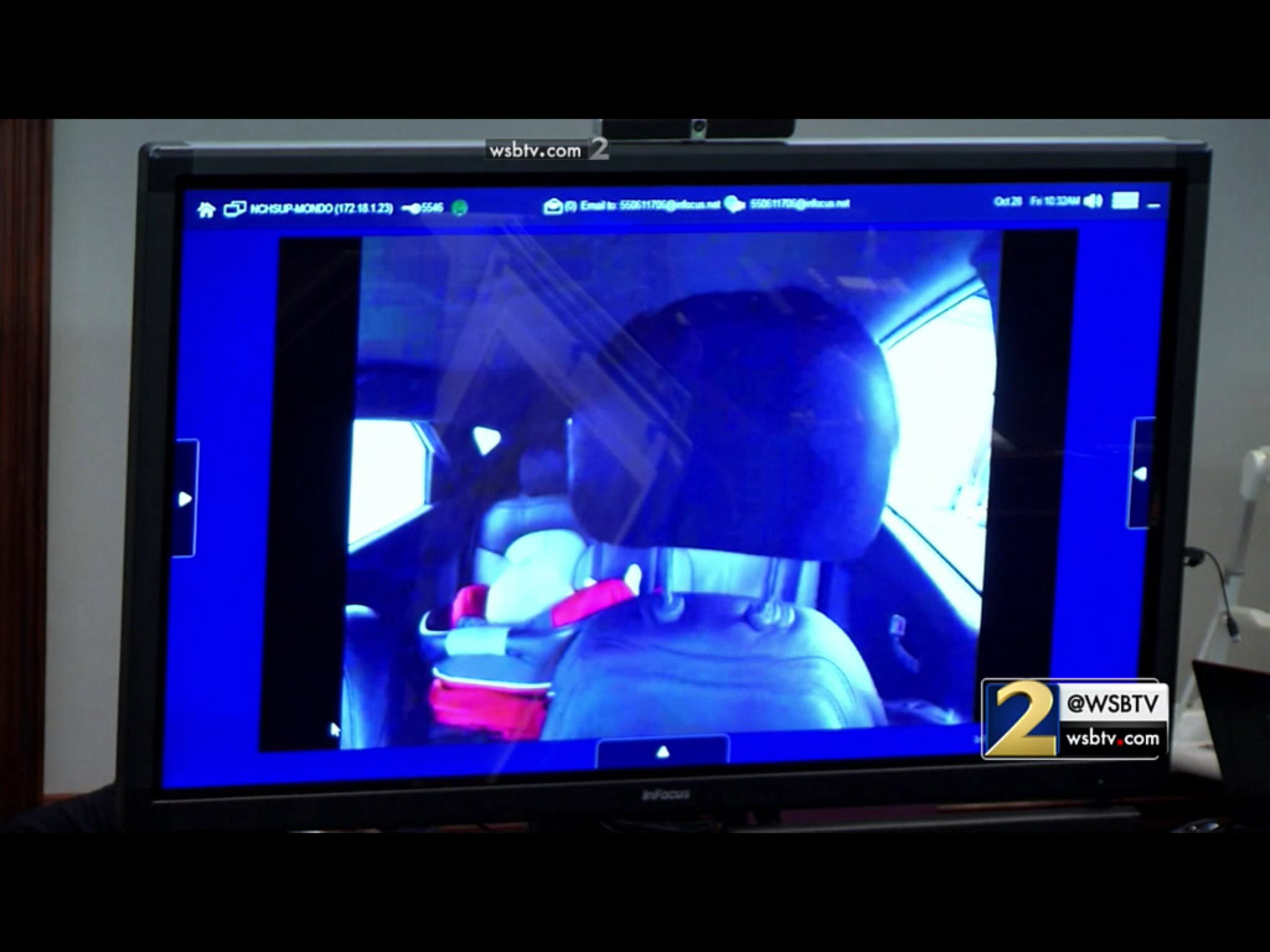 Prosecutors show images from a panoramic photo taken inside Justin Ross Harris' SUV, as taken by a 3D scanner, during Harris' murder trial at the Glynn County Courthouse in Brunswick, Ga., on Friday, Oct. 28, 2016. The photos were taken from approximately the eye level of a driver, but Harris' defense has hotly argued whether these "sight lines" are accurate to what Harris would have actually seen. (screen capture via WSB-TV)