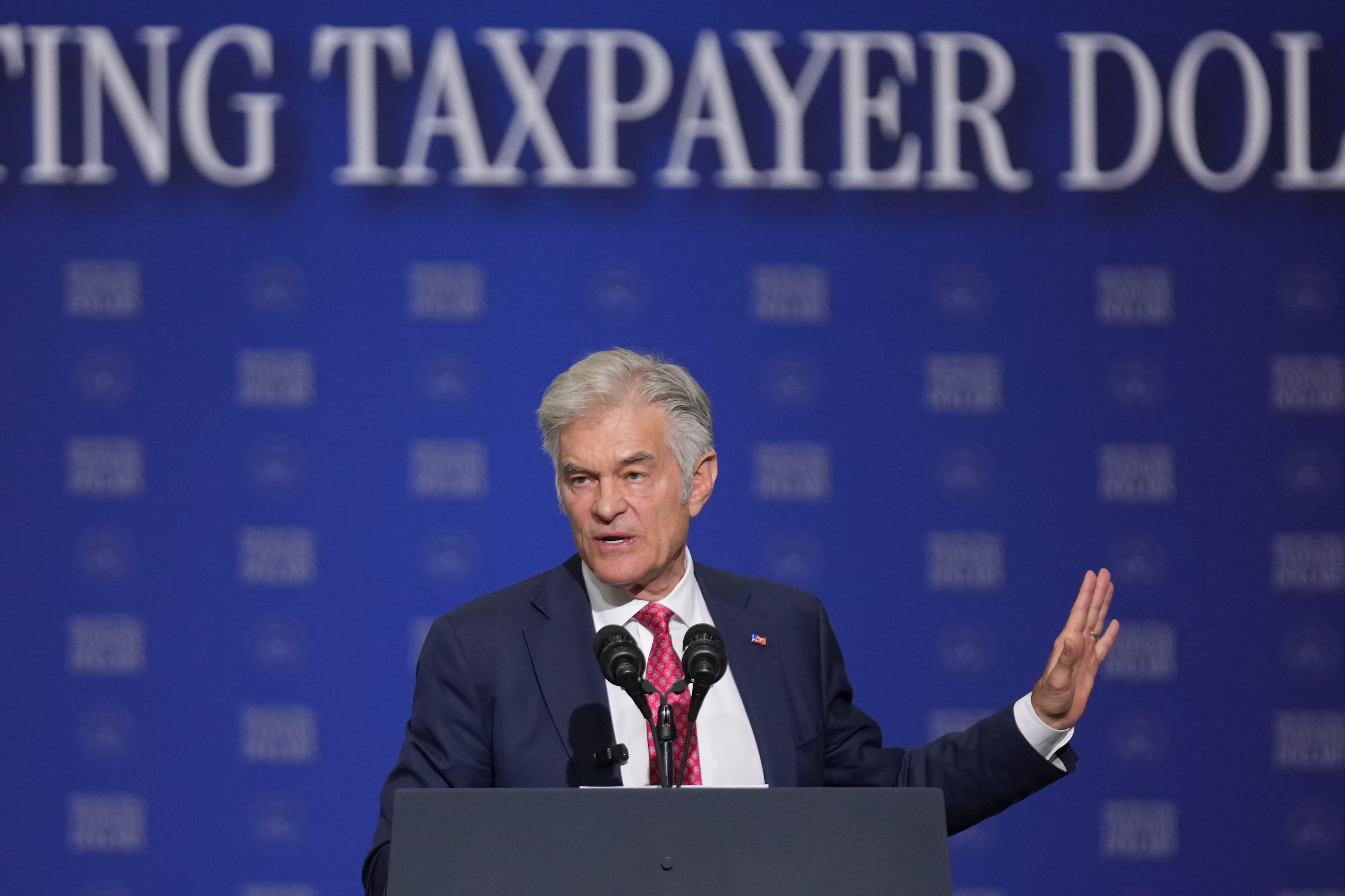 Centers for Medicare & Medicaid Services administrator Dr. Mehmet Oz speaks at the Wisconsin Air National Guard facility at Milwaukee Mitchell International Airport earlier this month. (Mark Schiefelbein/AP)