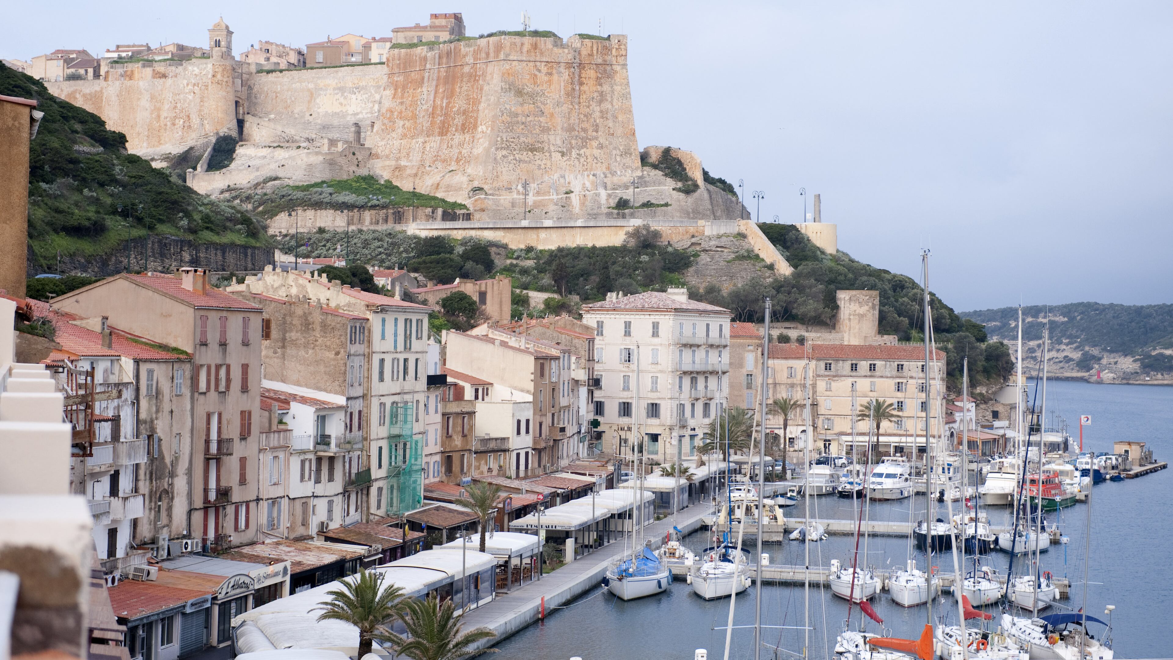 The cliff-top citadel and harbor of Bonifacio, a medieval town on the southern tip of the French island of Corsica, in March, 2016. Corsica is a resilient and dramatically beautiful island that holds itself apart from mainland France. (Susan Wright/The New York Times)