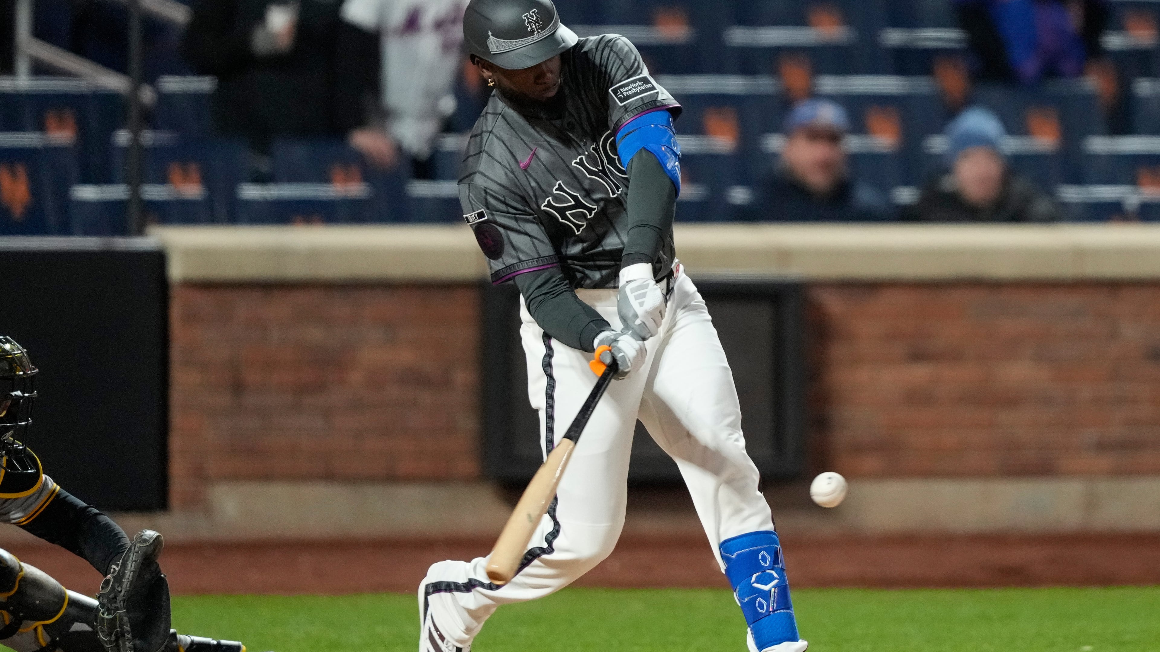 New York Mets center fielder Luis Robert Jr. (88) hits a three run home run during the eleventh inning of a baseball game against the Pittsburgh Pirates, Saturday, March 28, 2026, in New York. (AP Photo/Yuki Iwamura)