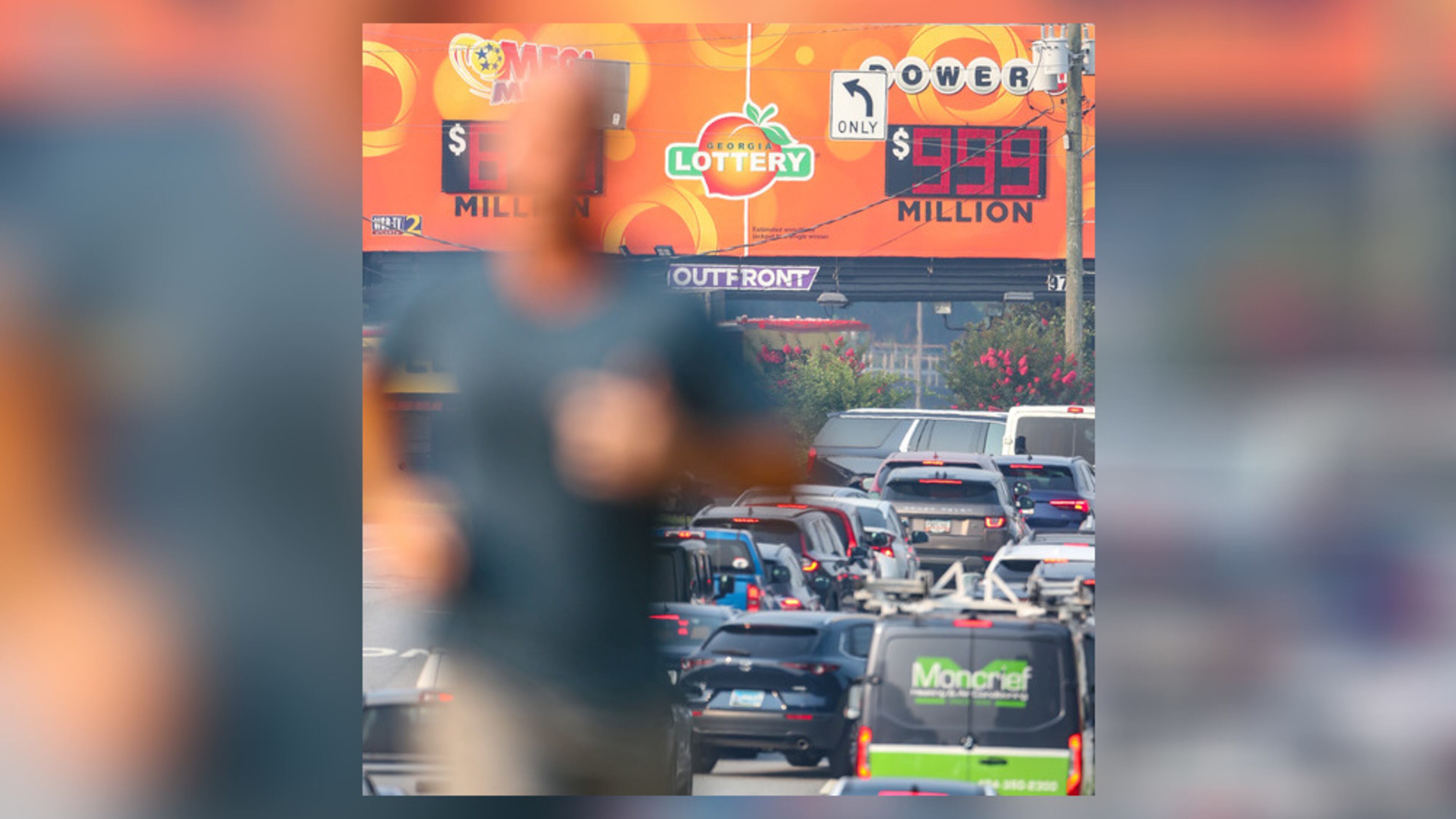 A sign in Brookhaven on Tuesday shows the rising Powerball jackpot, which has reached an estimated $1 billion ahead of Wednesday night's drawing.