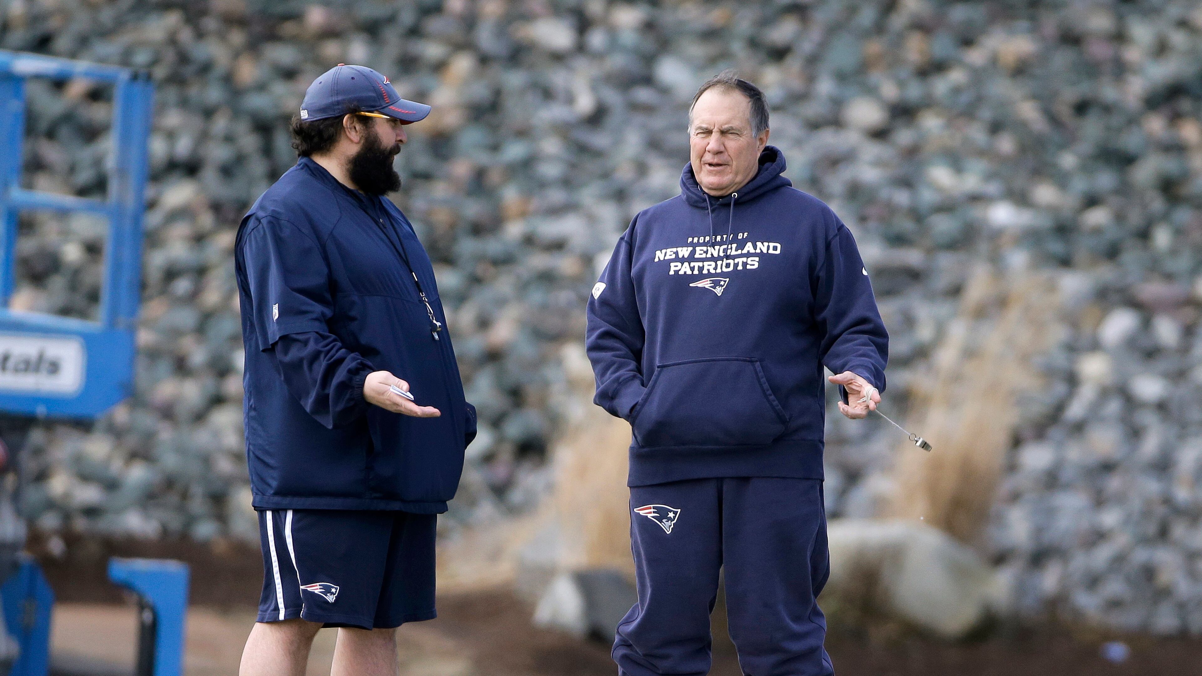 New England Patriots defensive coordinator Matt Patricia, left, speaks with head coach Bill Belichick, right, during an NFL football practice, Thursday, Jan. 12, 2017, in Foxborough, Mass. (AP Photo/Steven Senne)