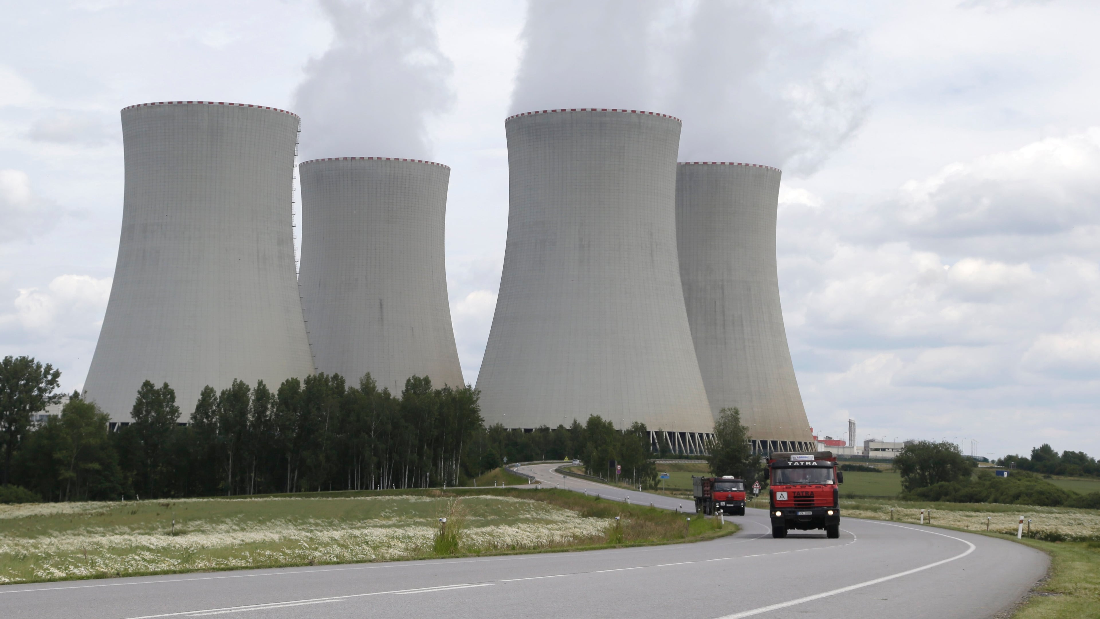 FILE - Smoke rises from the cooling towers of the nuclear power plant Temelin near the town of Tyn nad Vltavou, Czech Republic, June 25, 2015. (AP Photo/Petr David Josek, File)