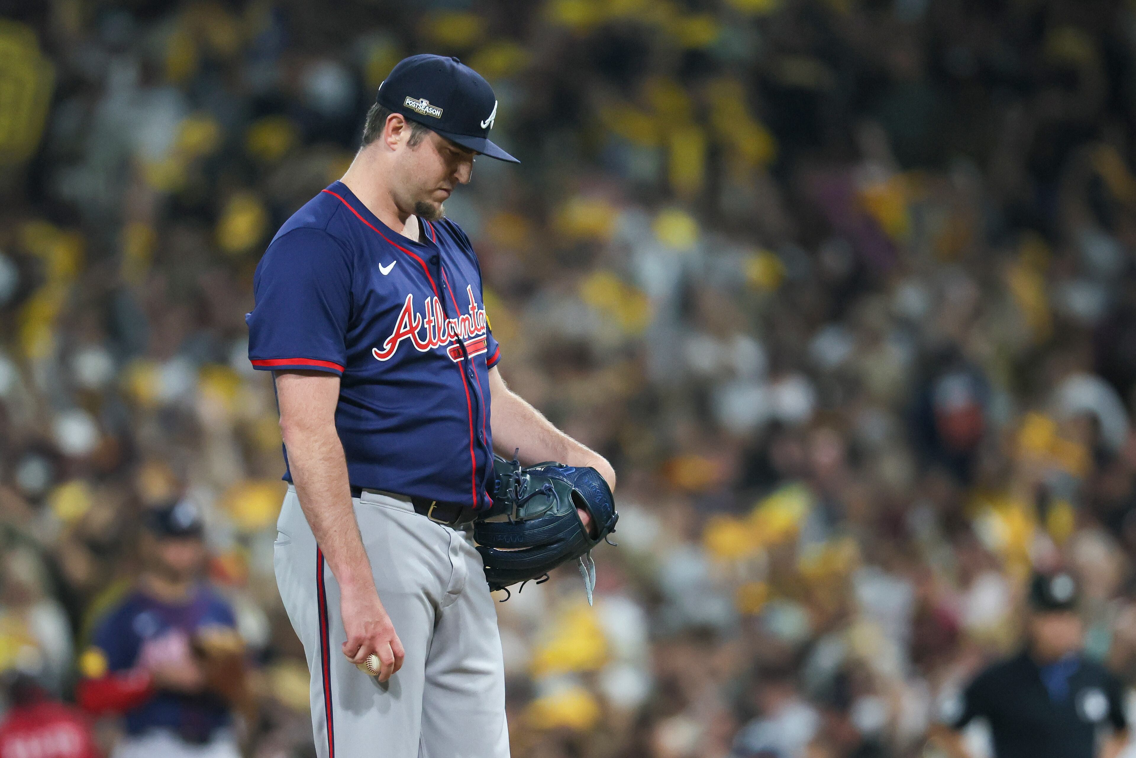 Atlanta Braves pitcher Luke Jackson (22) reacts after delivering a home run pitch to San Diego Padres’ Kyle Higashioka during the ninth inning of National League Division Series Wild Card Game One at Petco Park in San Diego on Tuesday, Oct. 1, 2024. (Jason Getz / Jason.Getz@ajc.com)