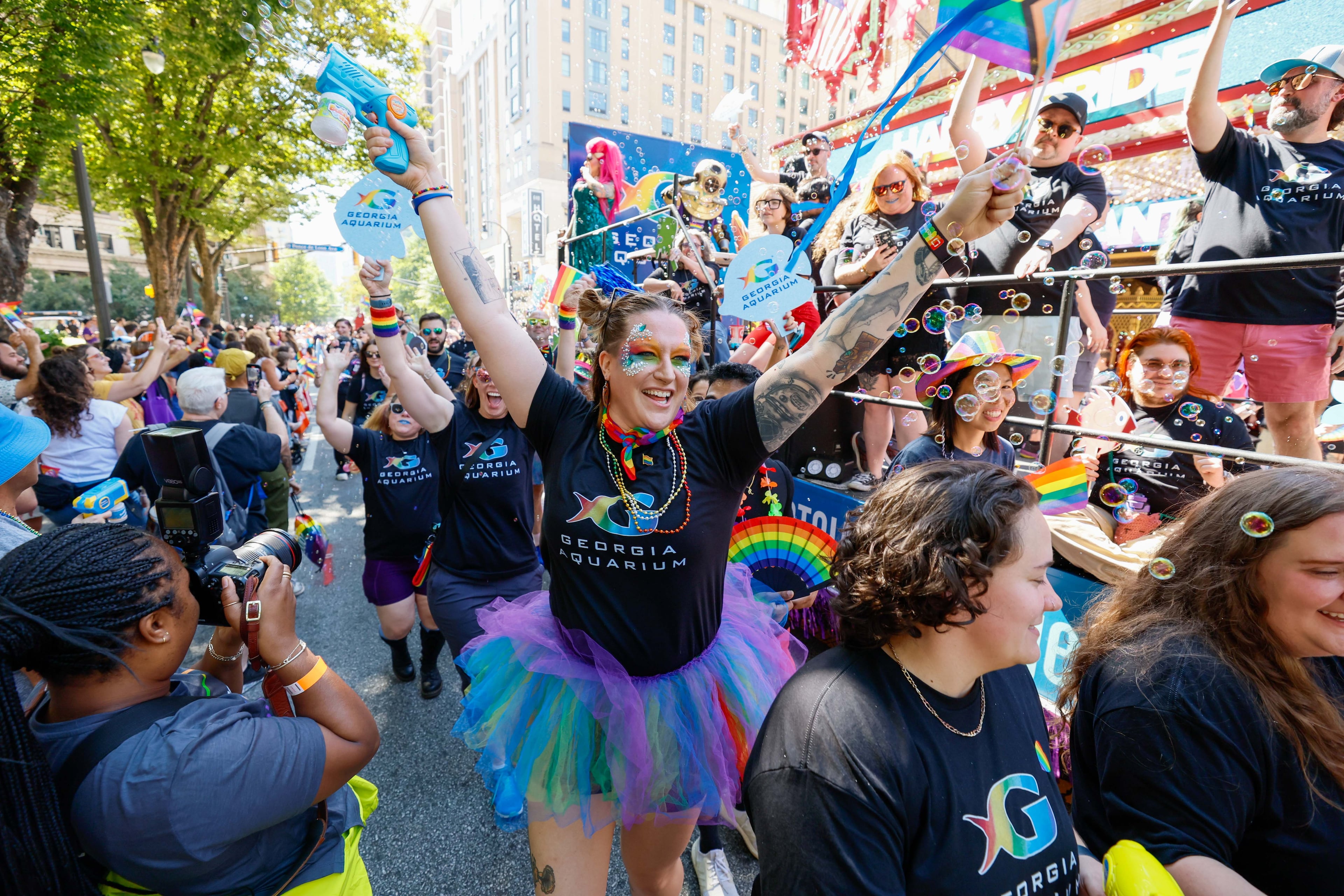 A member of the Georgia Aquarium enjoys the annual Pride Parade in Atlanta on Sunday, Oct. 13, 2024.
(Miguel Martinez / AJC)