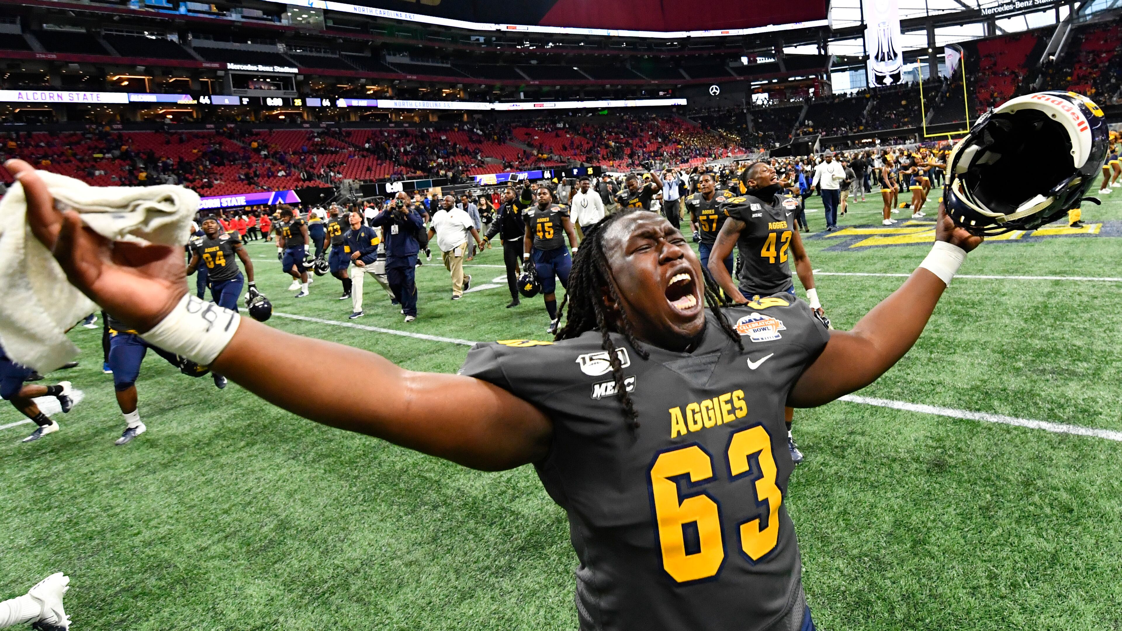 North Carolina A&T offensive lineman Jeremiah Martin celebrates after winning the Celebration Bowl Saturday, Dec. 21, 2019, over the Alcorn State Braves at Mercedes-Benz Stadium in Atlanta.