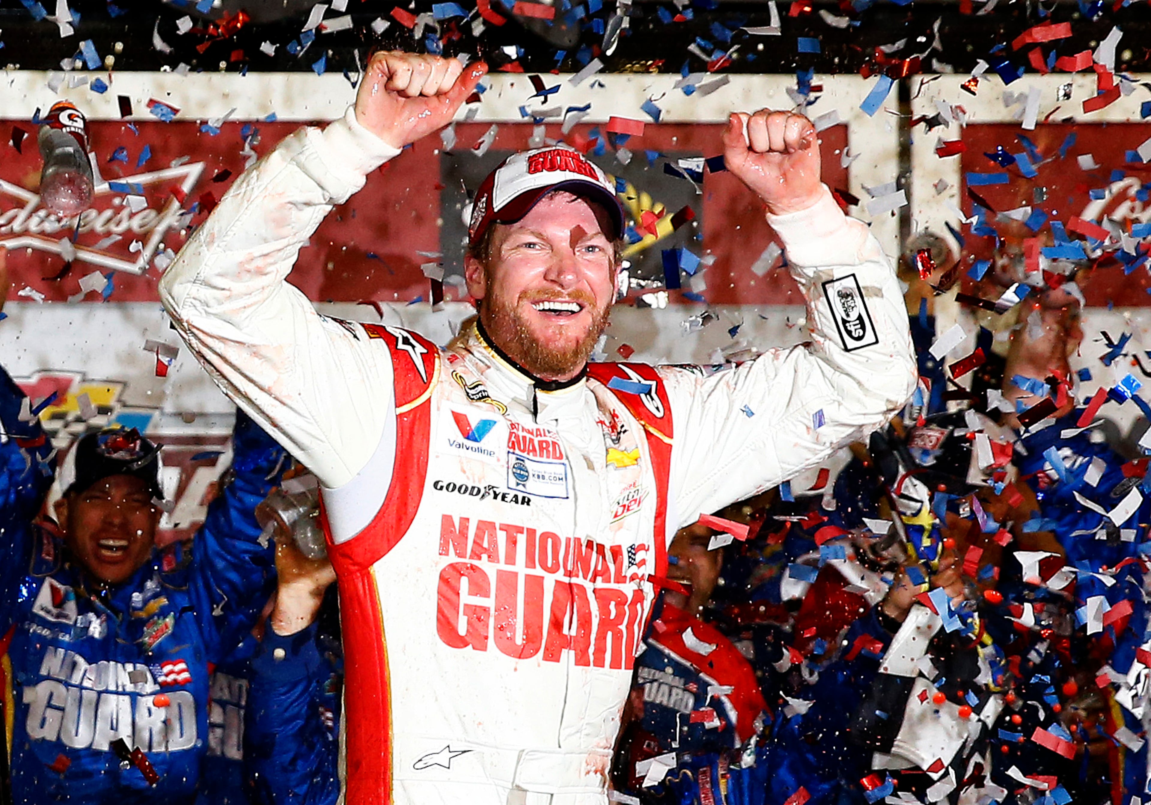 DAYTONA BEACH, FL - FEBRUARY 23: Dale Earnhardt Jr., driver of the #88 National Guard Chevrolet, celebrates in Victory Lane after winning the NASCAR Sprint Cup Series Daytona 500 at Daytona International Speedway on February 23, 2014 in Daytona Beach, Florida. (Photo by Tom Pennington/Getty Images)