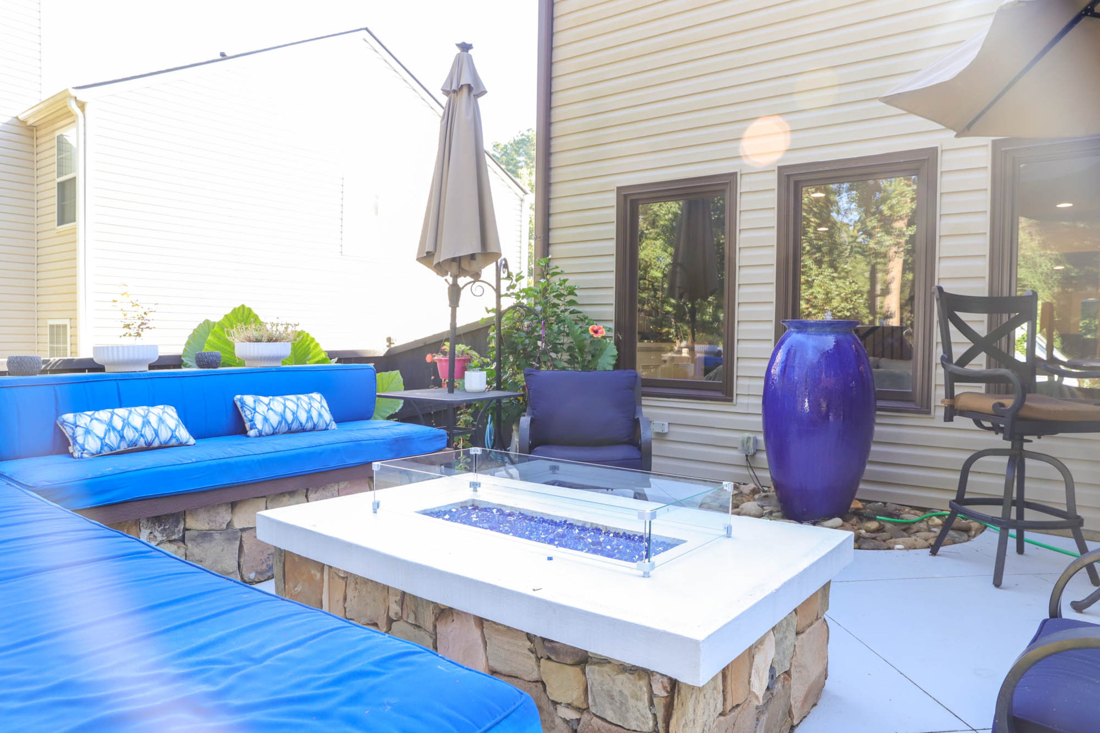 When Liza Hare drew out the designs for her backyard oasis she deliberately left a semicircle by the house unpaved. Here she placed a large urn water feature, one of her favorite focal points in the space, which she can see and enjoy from indoors as well. Text by Shannon Dominy/Photo by Reynolds Rogers