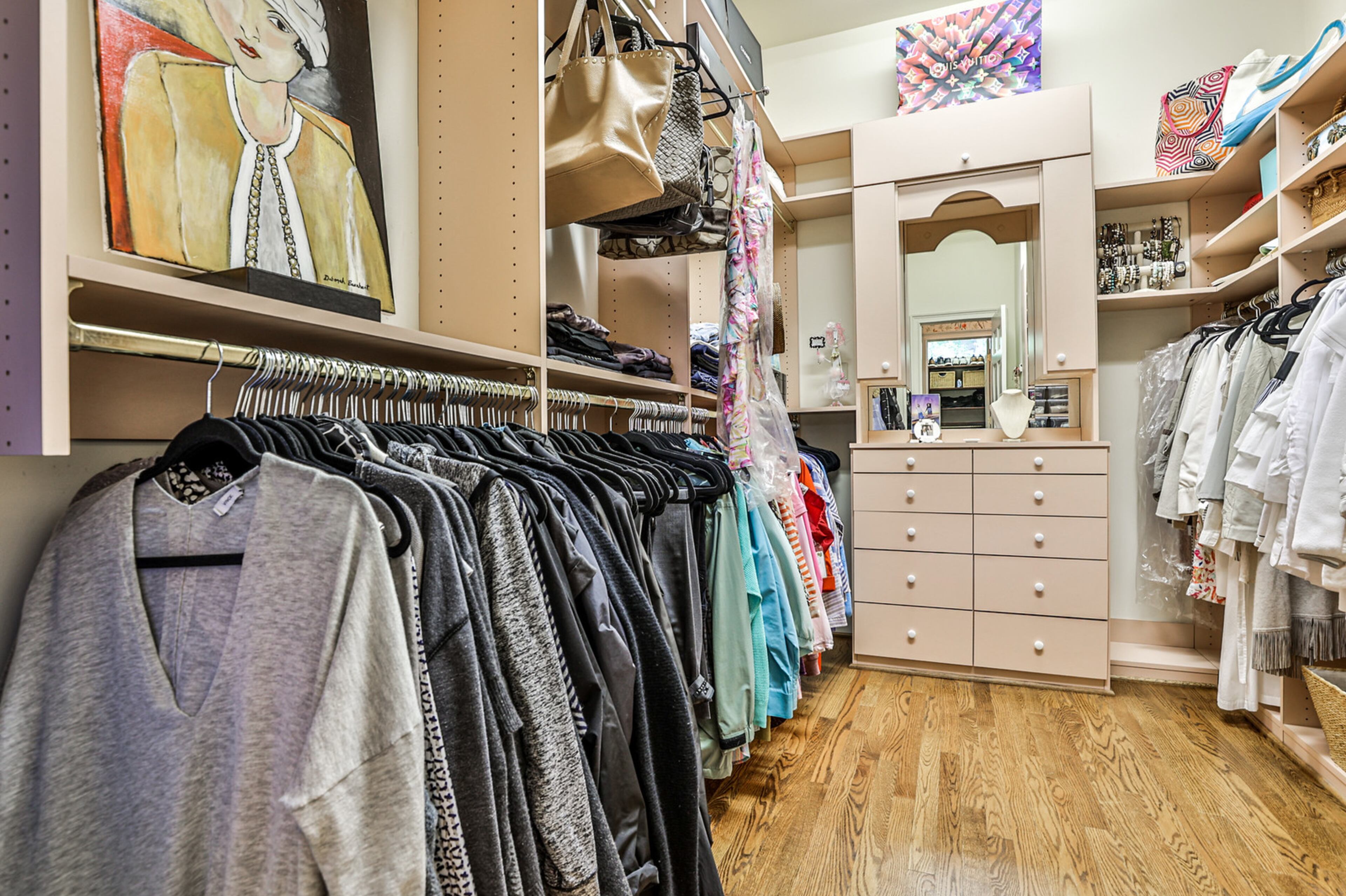 Owner's spa bath with quartz counters, dual water closets with bidet, steam shower and two walk-in closets. Text by Jan Hart