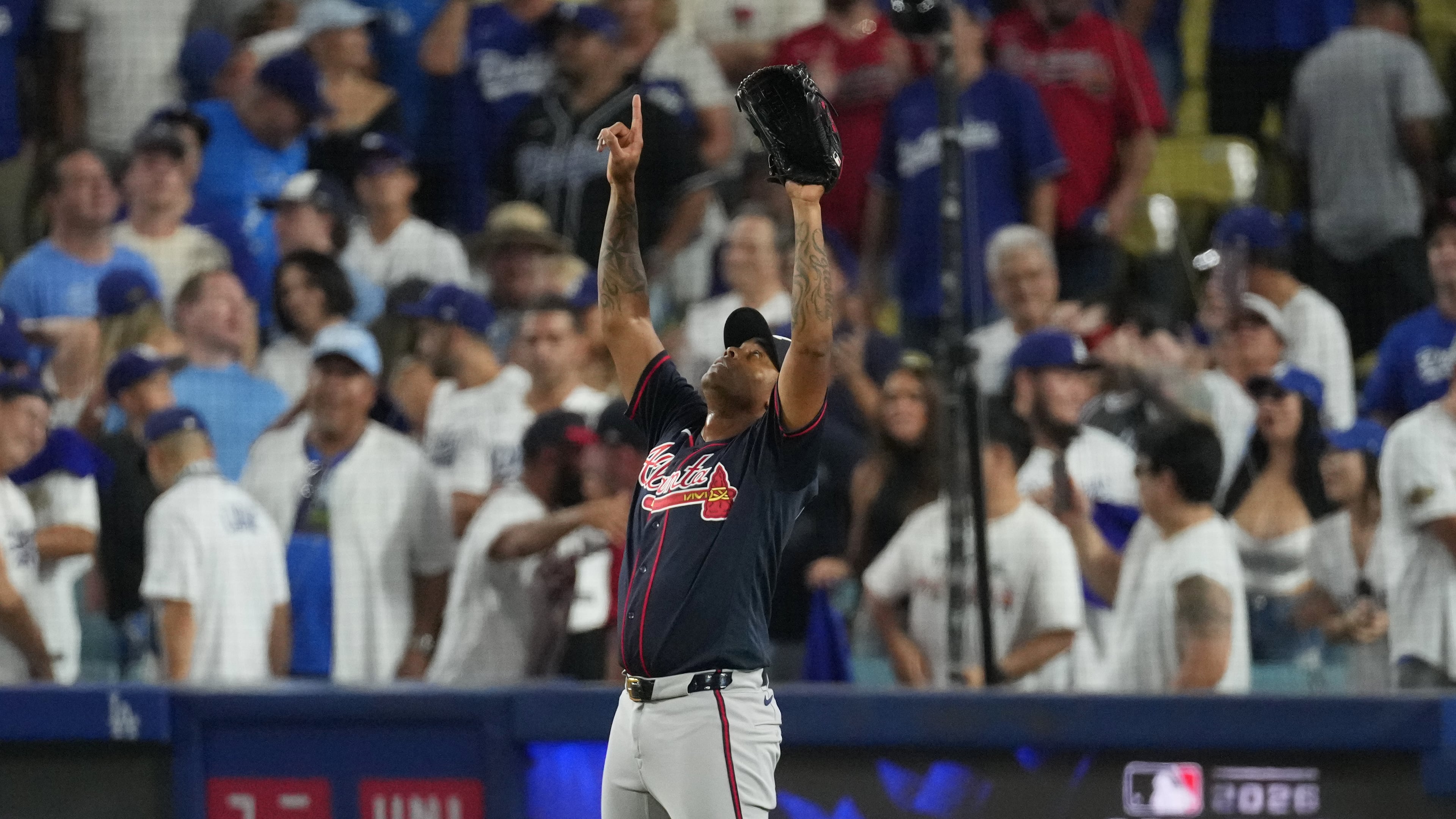 Atlanta Braves pitcher Raisel Iglesias celebrates after the Braves defeated the Los Angeles Dodgers 3-2 in Game 2 of a National League Division Series baseball game Sunday, Oct. 4, 2026, in Los Angeles. (Jae C. Hong/AP)