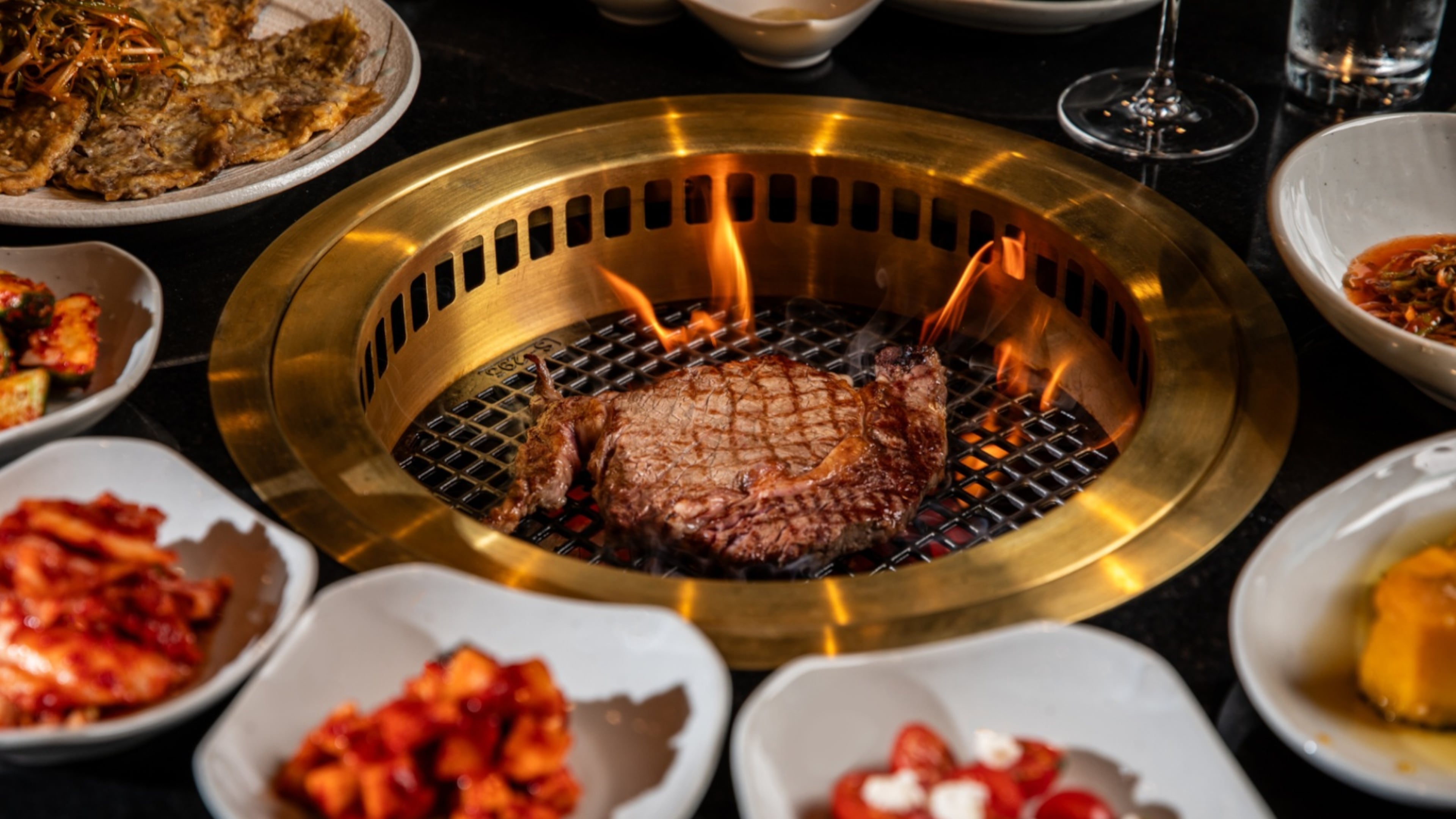 Bene Korean Steakhouse in the Uptown Atlanta development offers a variety of proteins and side dishes. / Courtesy of Bene Korean Steakhouse
