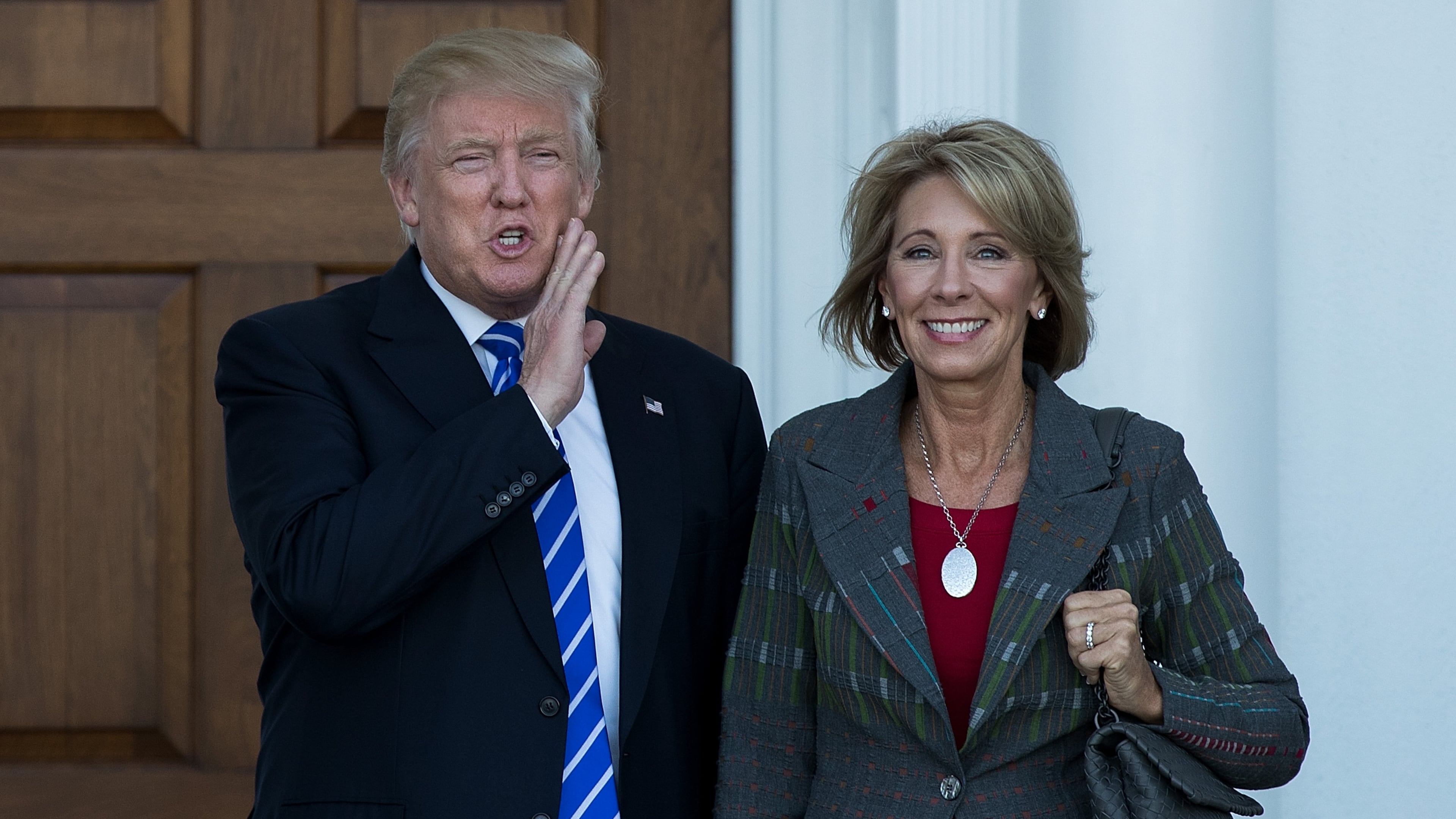 Donald Trump's education nominee Betsy DeVos cleared a Senate committee vote but may face a challenge with the full Senate now. (Photo by Drew Angerer/Getty Images)