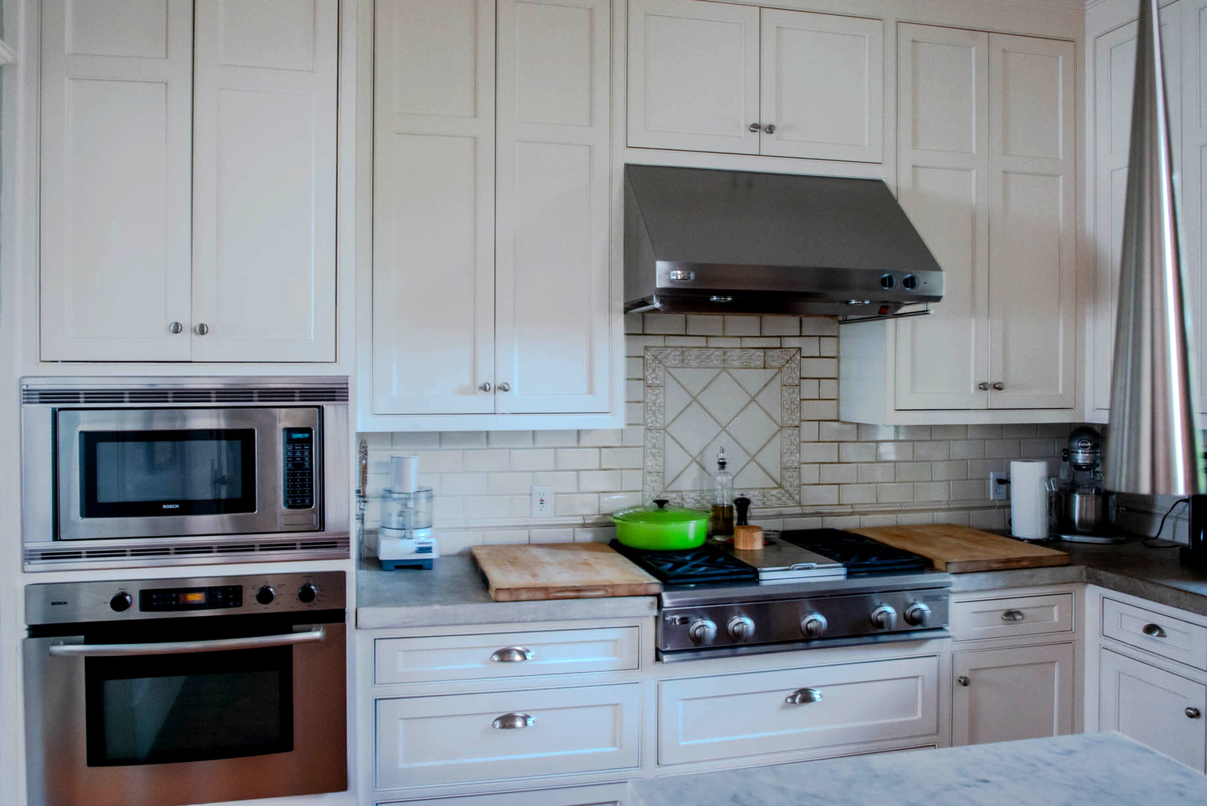 When they bought the home in 2005, the kitchen had no appliances and had only one cabinet, said Charlie Lefort. "It was disgusting," Lefort said. "That was really a blank slate," he said. The cabinets by Phil Plunkett extend all the way up, which Lefort said accentuates the ceiling height.