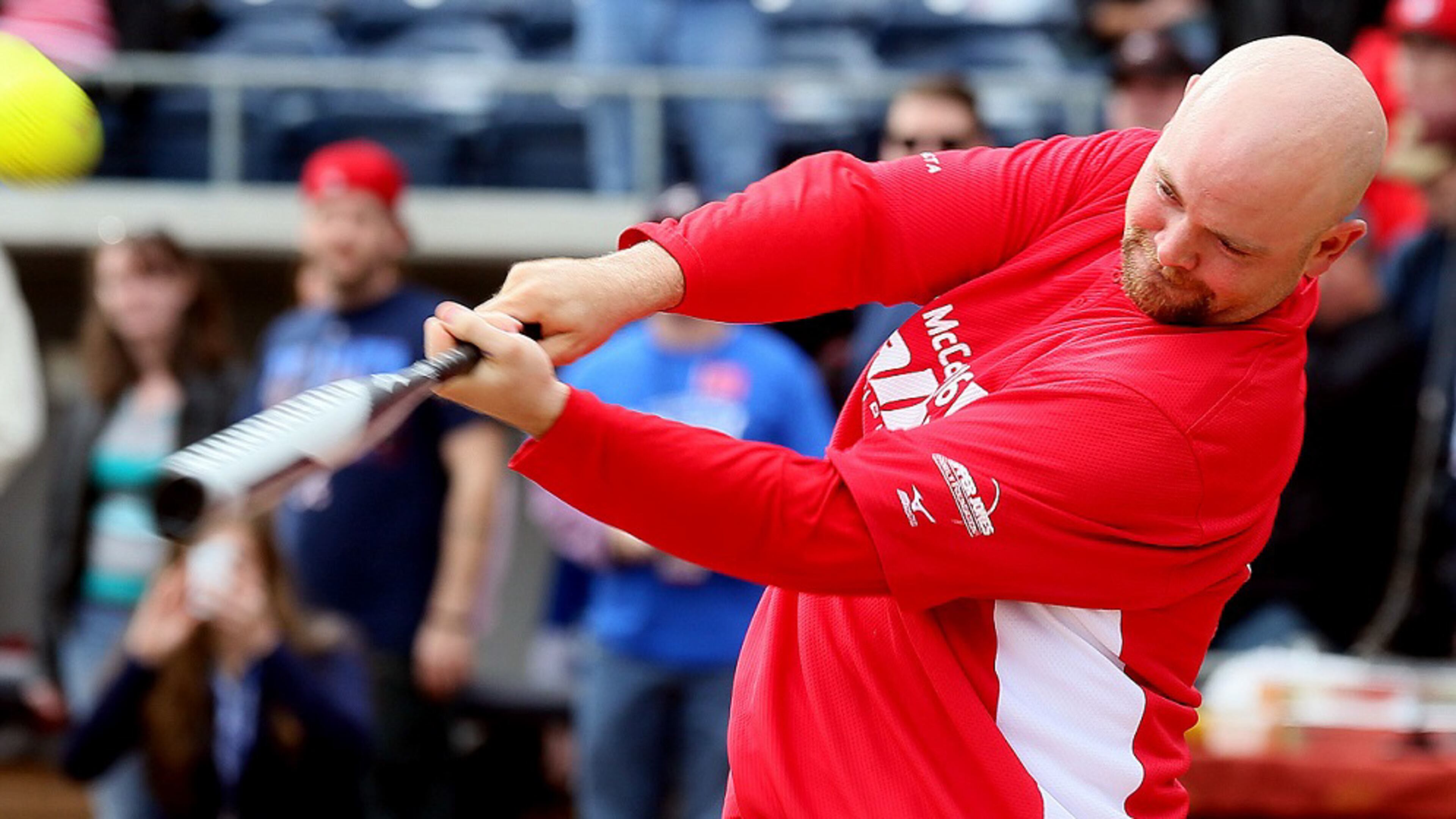 Brian McCann swings for the fences during the Home Run Challenge, part of the fifth annual Brian McCann Rally Foundation Celerity Softball Game at Coolray field in Lawrenceville on Nov. 9, 2013. Bert's Big Bats team played against Tug's Triple Threat in the event that raised funds for childhood cancer research. PHIL SKINNER / AJC file photo