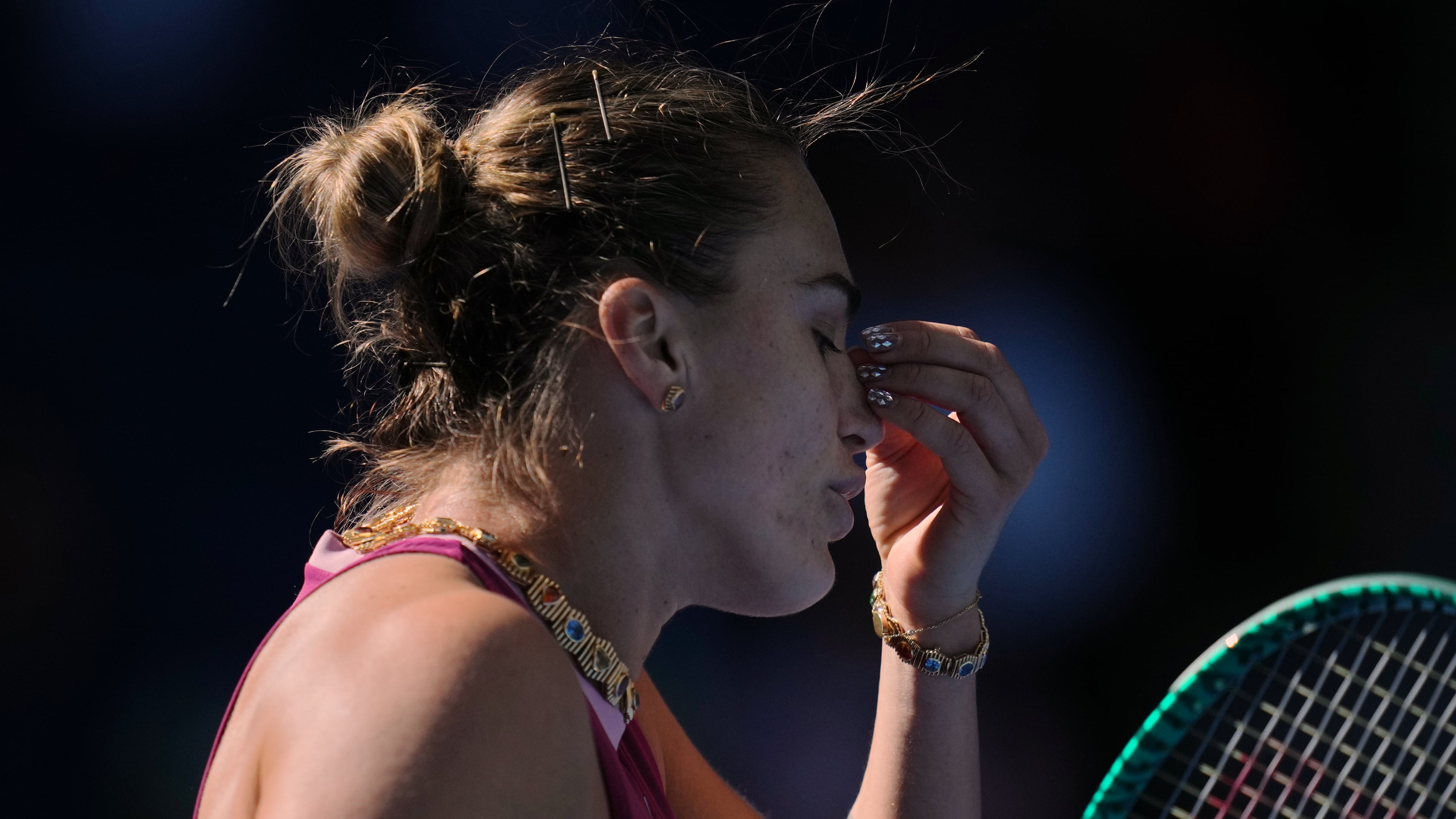 Aryna Sabalenka, of Belarus, reacts during the third round of the women's singles match against Nikola Bartunkova, of the Czech Republic, at the China Open tennis tournament in Beijing, Sunday, Oct. 4, 2026. (AP Photo/Achmad Ibrahim)