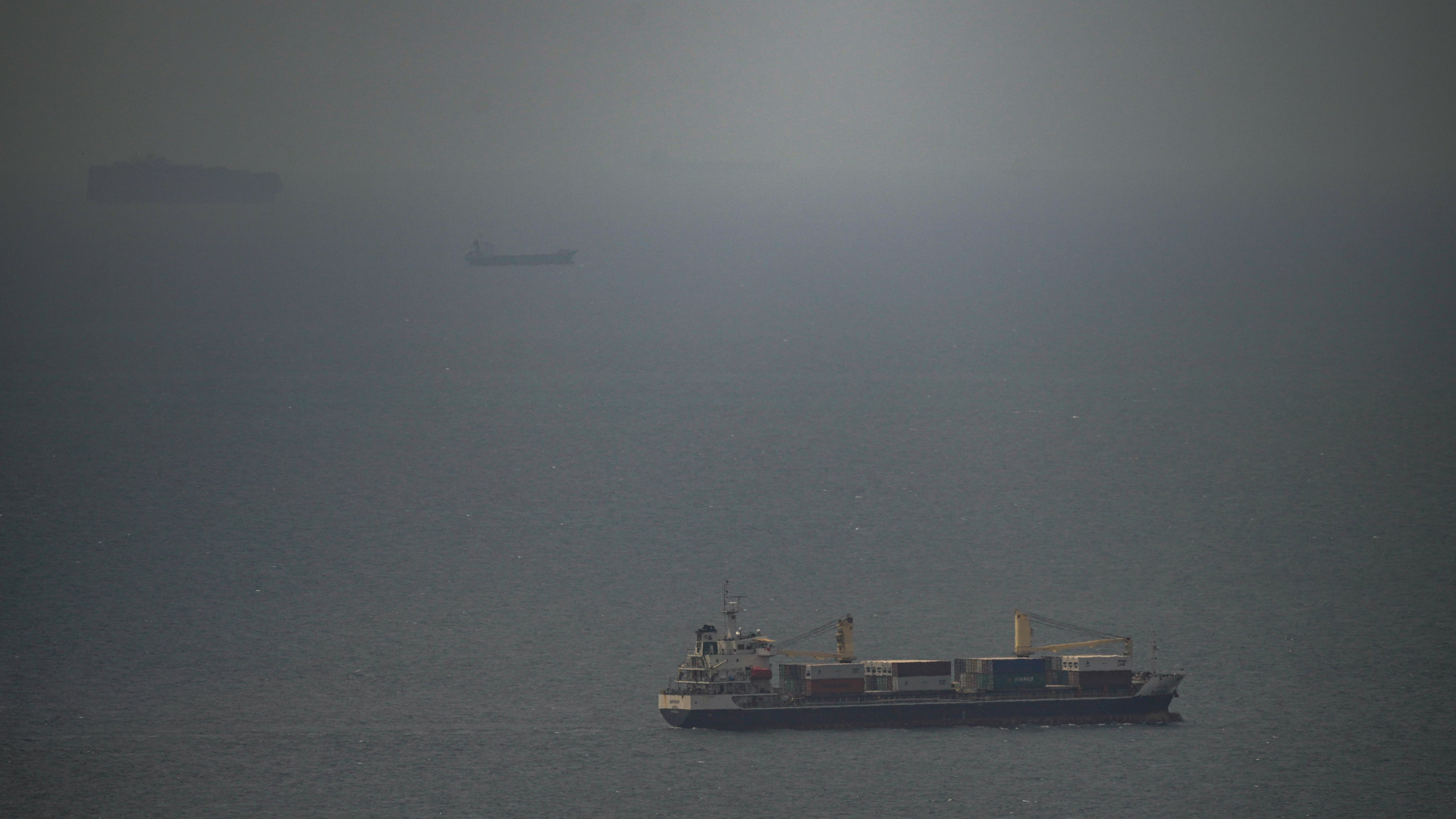 A cargo ship sails in the Persian Gulf toward the Strait of Hormuz, Wednesday, April 22, 2026. (AP Photo)