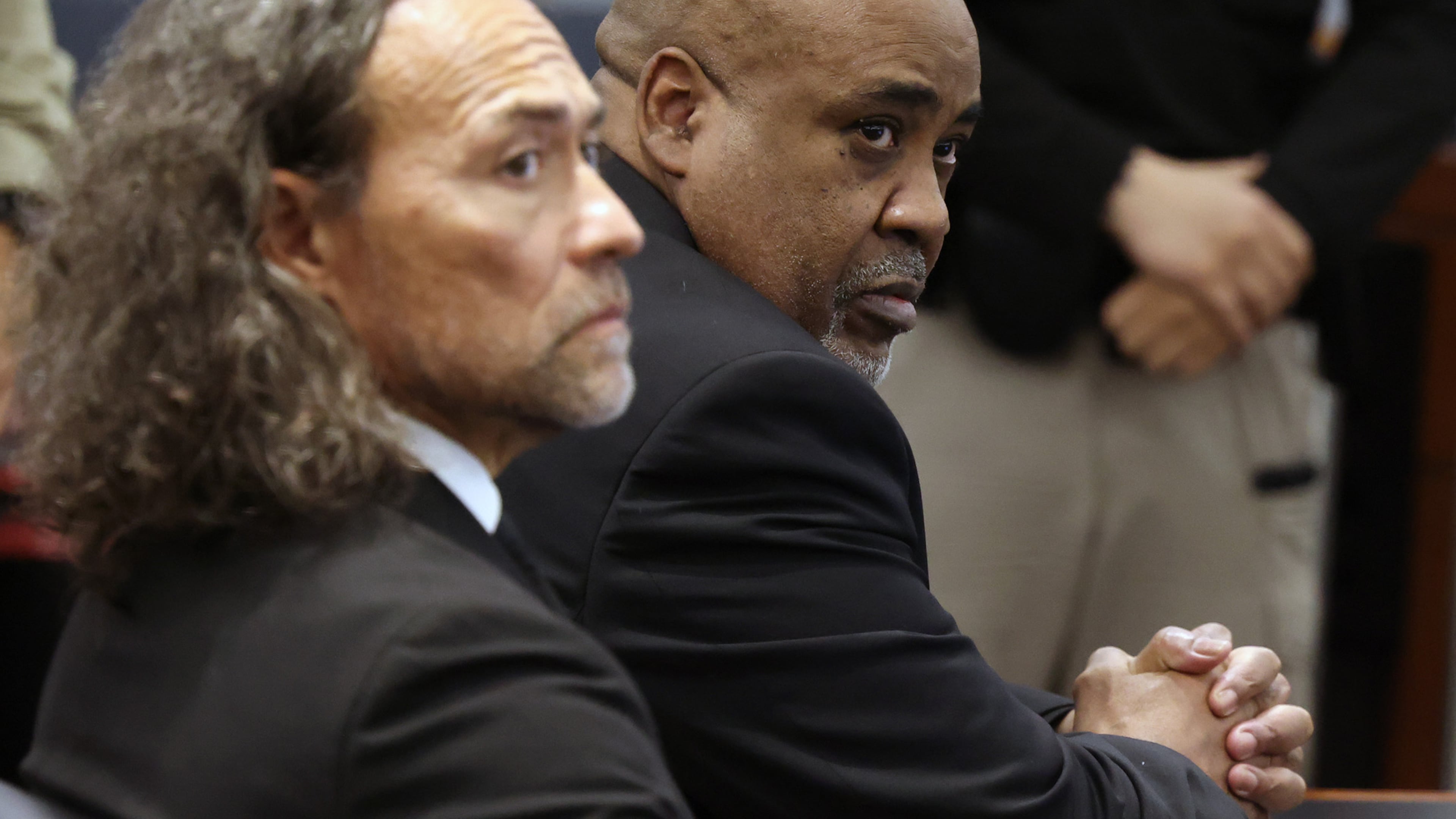 Duane Davis, right, and his attorney Michael Sanft sit in a courtroom after a jury found Davis guilty of first-degree murder in his trial related to the 1996 killing of rapper Tupac Shakur, at Clark County District Court Regional Justice Center, Monday, Aug. 31, 2026, in Las Vegas. (Bizuayehu Tesfaye/Las Vegas Review-Journal via AP, Pool)