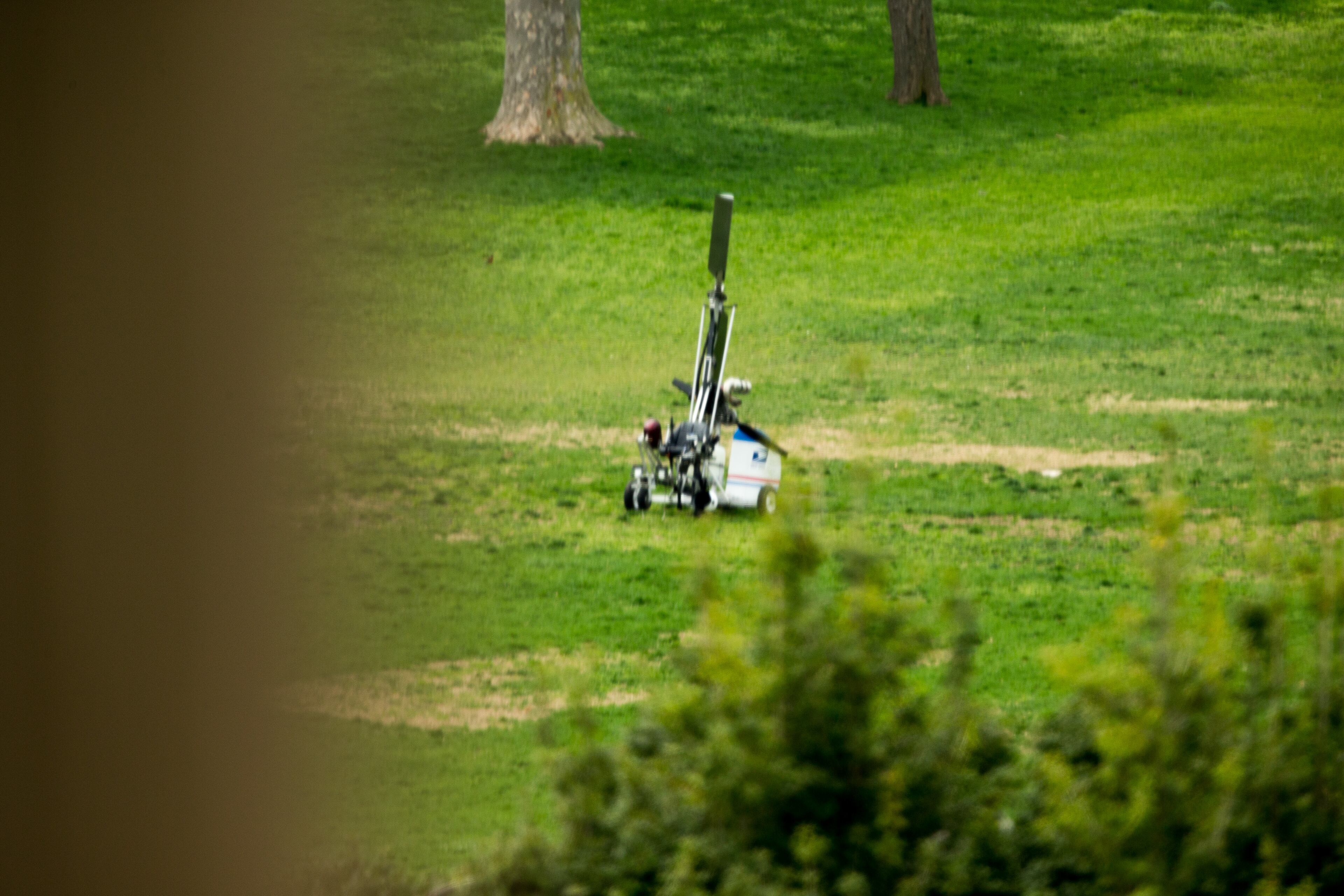 A small helicopter lands on the West Lawn of the Capitol in Washington, Wednesday, April 15, 2015, after landing. (AP Photo/Andrew Harnik)