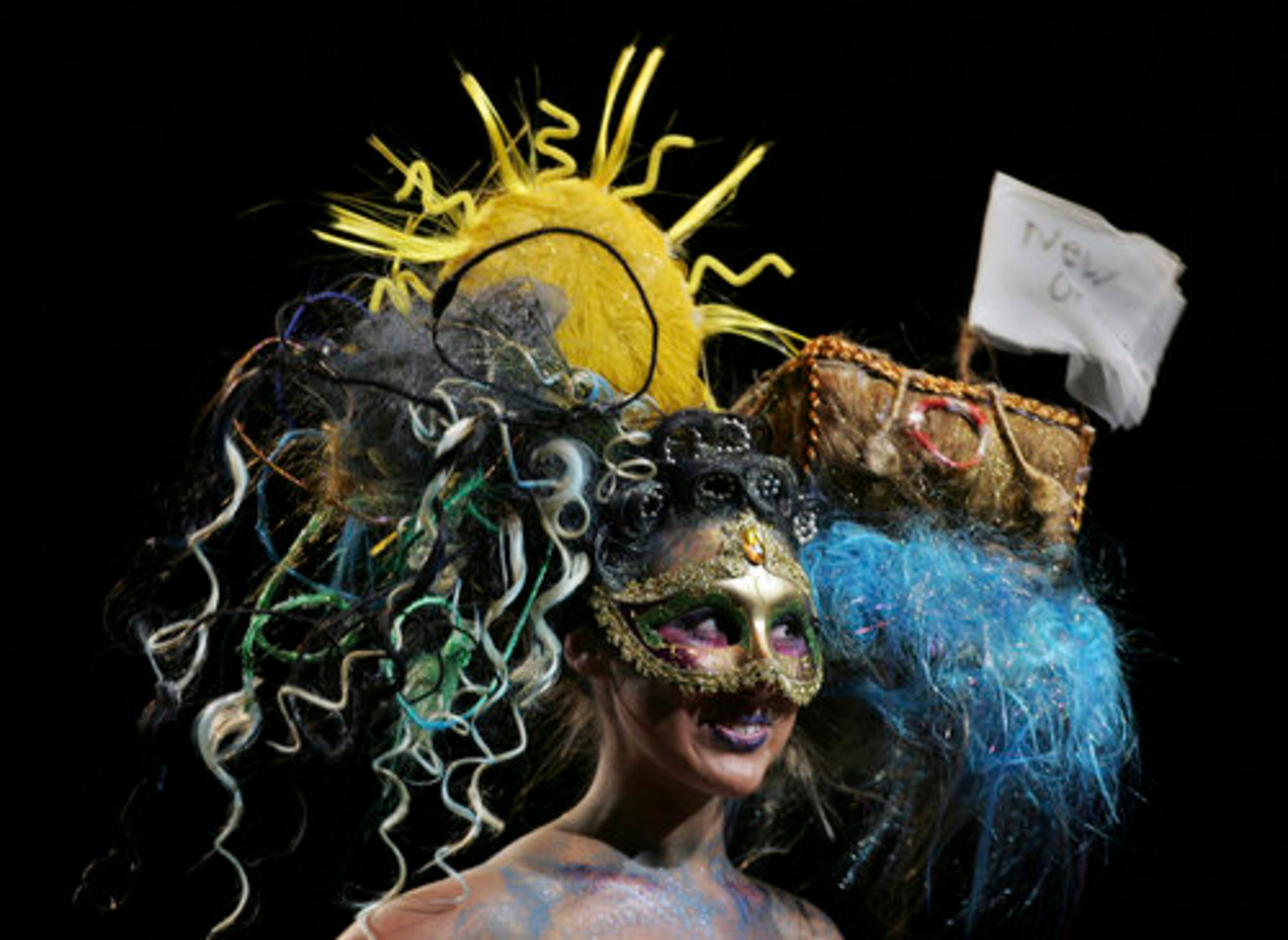 Model Danielle Baker shows off a hair design by Laura Kaplan of Empire Beauty School in Laconia, N.H.