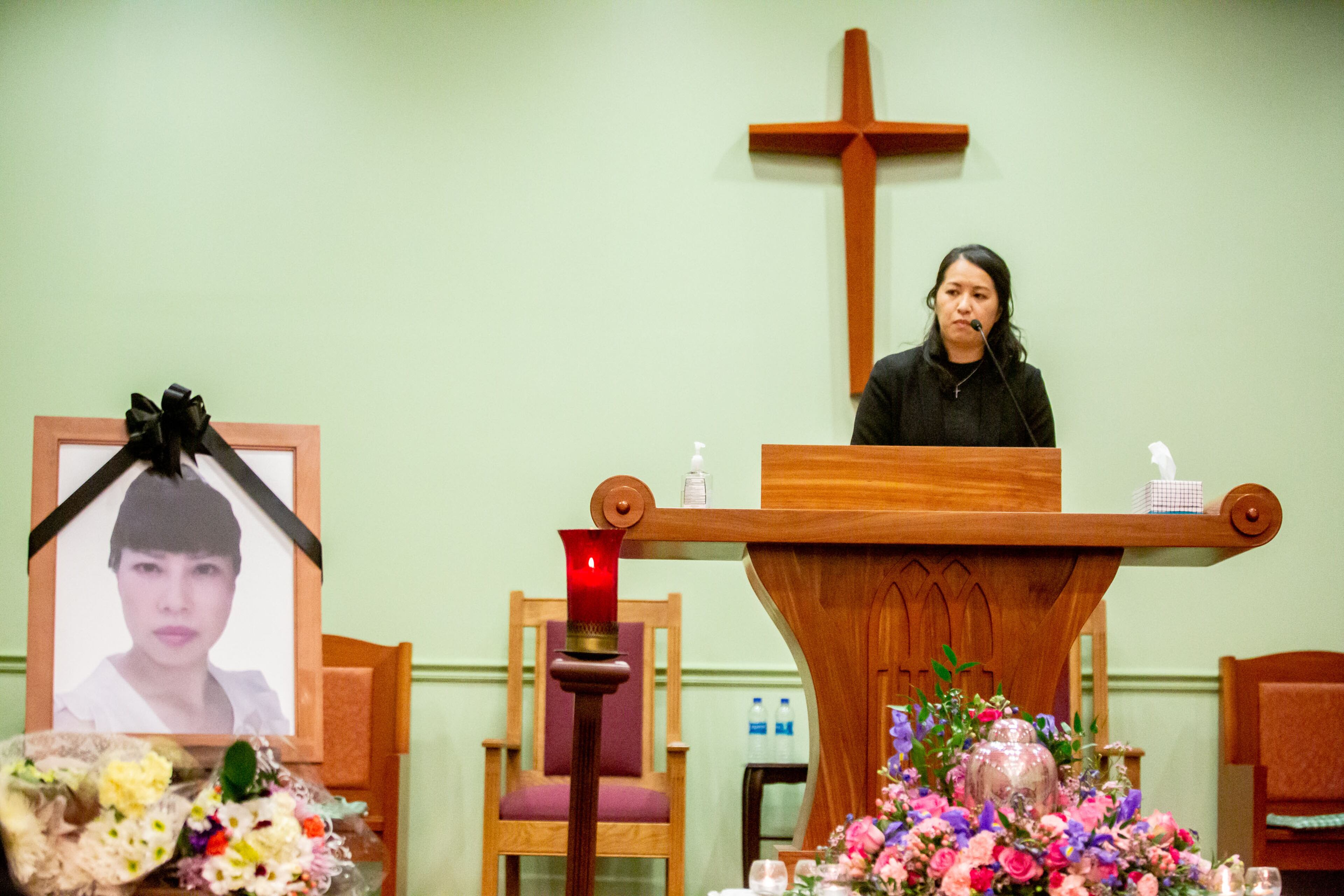 Victoria Huynh, vice president of the Center for Pan Asian Community Service, speaks at the funeral for Daoyou Feng in Norcross on Sunday, April 4, 2021. (Photo: Steve Schaefer for The Atlanta Journal-Constitution)