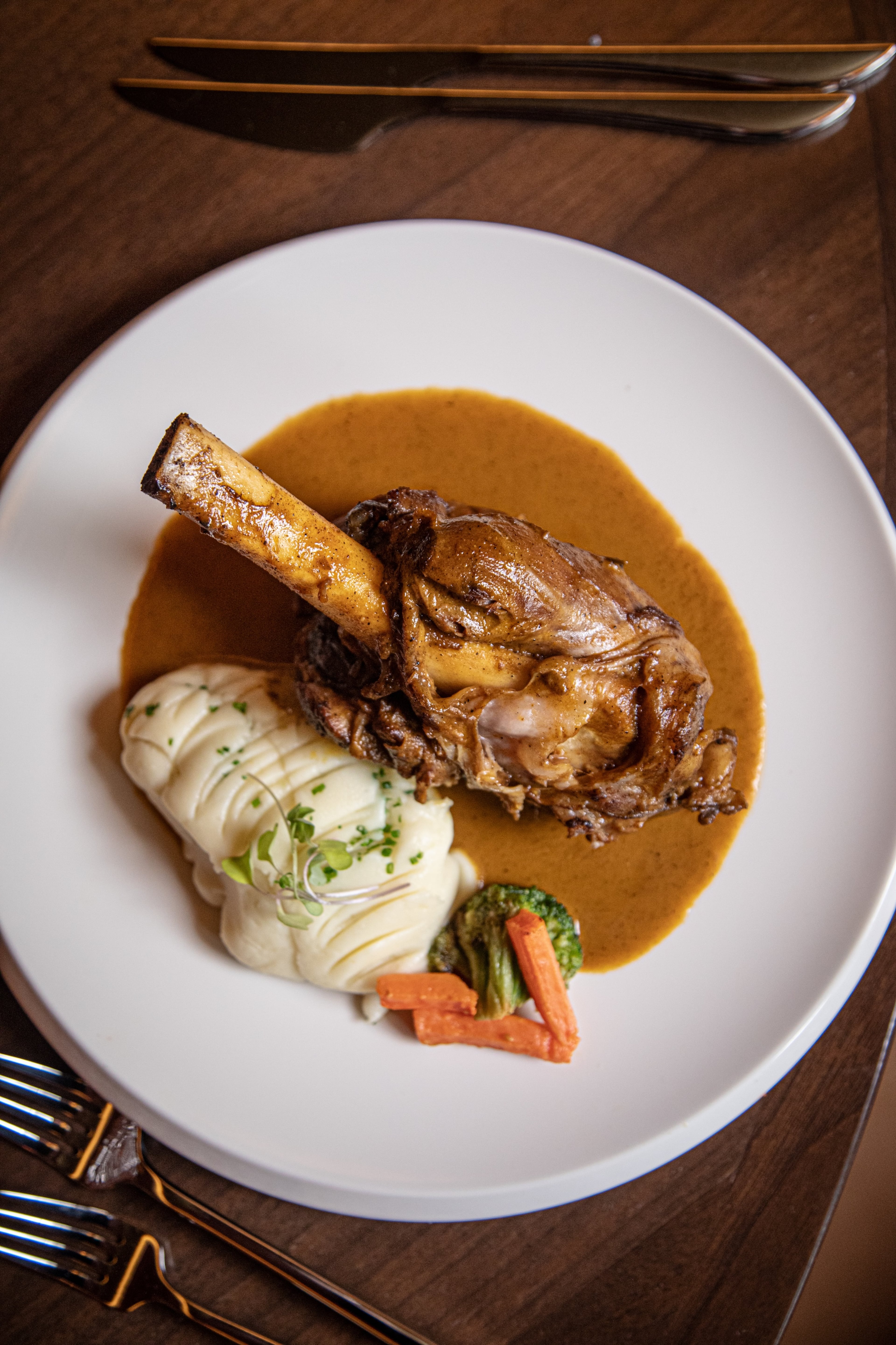 A slow-braised lamb shank at Pataaka. (Spark Novus / Courtesy of Pataaka)