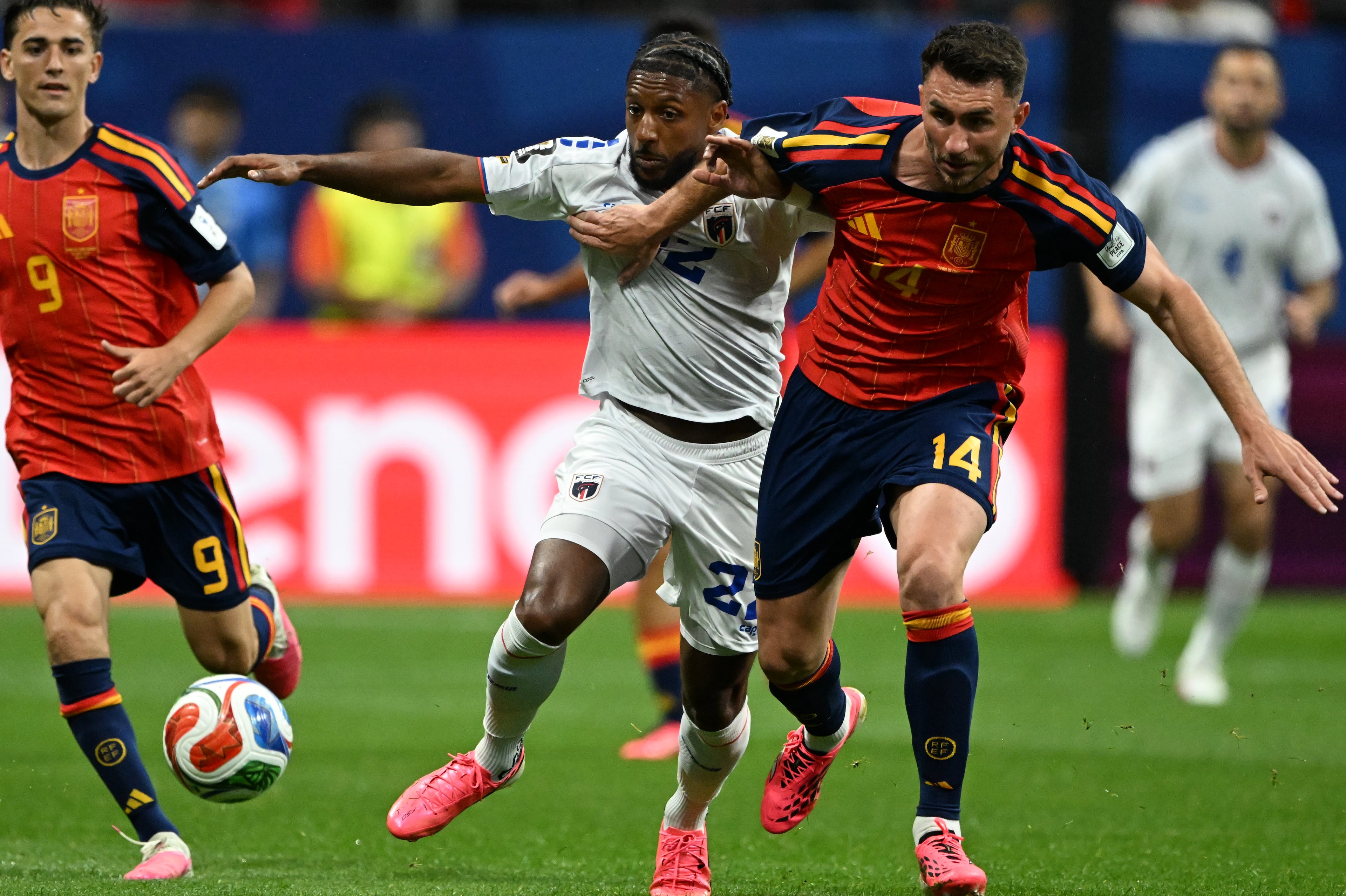 Cape Verde's Steven Moreira (center) battles Spain's Aymeric Laporte (right) during first half of Spain vs. Cape Verde Group H match at Atlanta Stadium (Mercedes-Benz Stadium) on Monday, June 15, 2026. (Hyosub Shin/AJC)