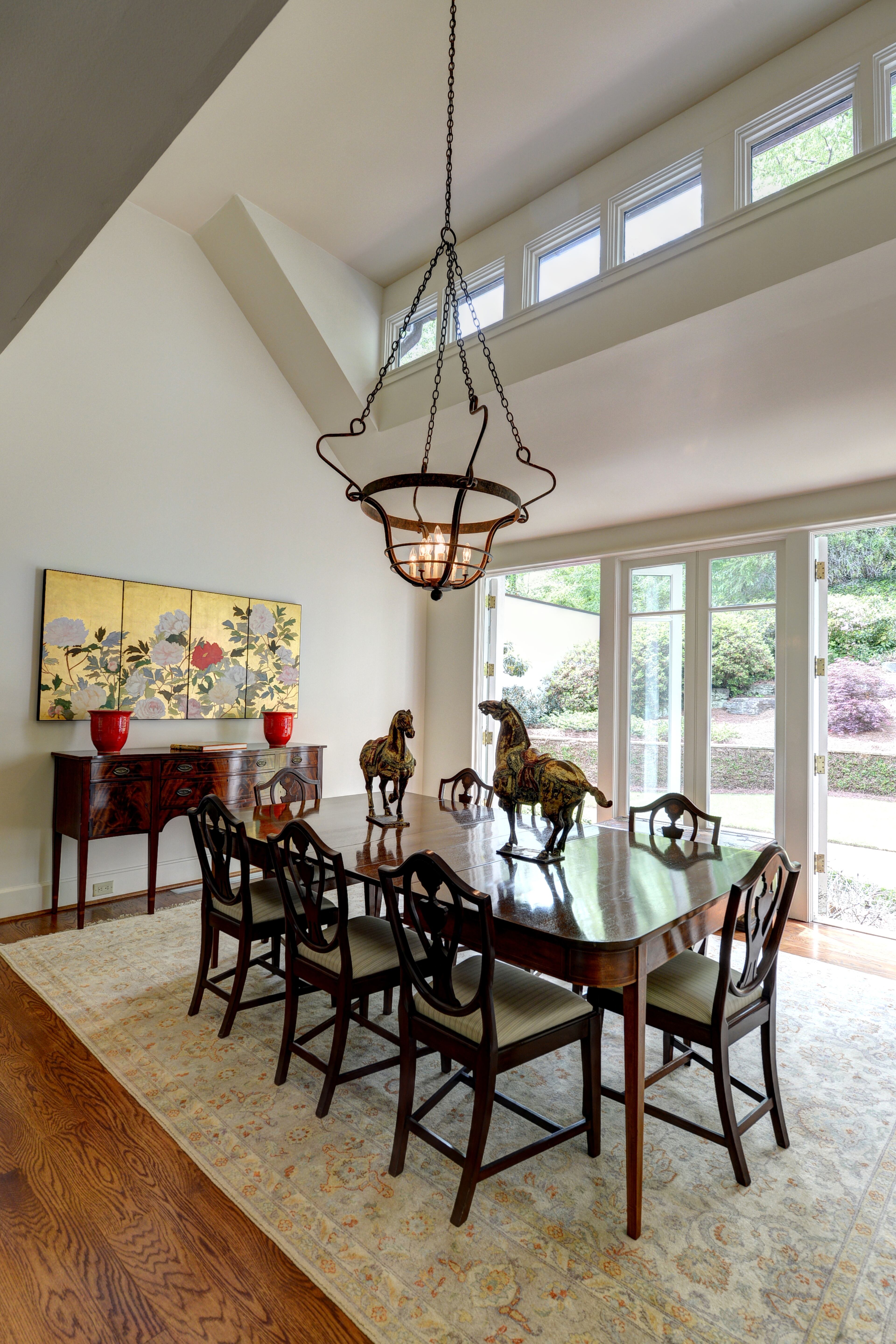 One of the few Bobby McAlpine designed homes in Atlanta, this deconstructed Dutch Colonial is the exact fit for the discerning buyer who seeks the extraordinary. Highest quality construction with cool spaces and complete privacy. 2.7 acres on a private street. Perfect as it is, or there are additional unfinished spaces within the house that would allow for 2 additional bedrooms and a 4th living area. Main level master, den and living room all open to large entertaining deck. Wonderful gourmet kitchen and updated baths, but the real star here is the architecture. For more information, please visit http://travisandmichael.idxco.com/idx/19269/details.php?idxID=092&listingID=5283979