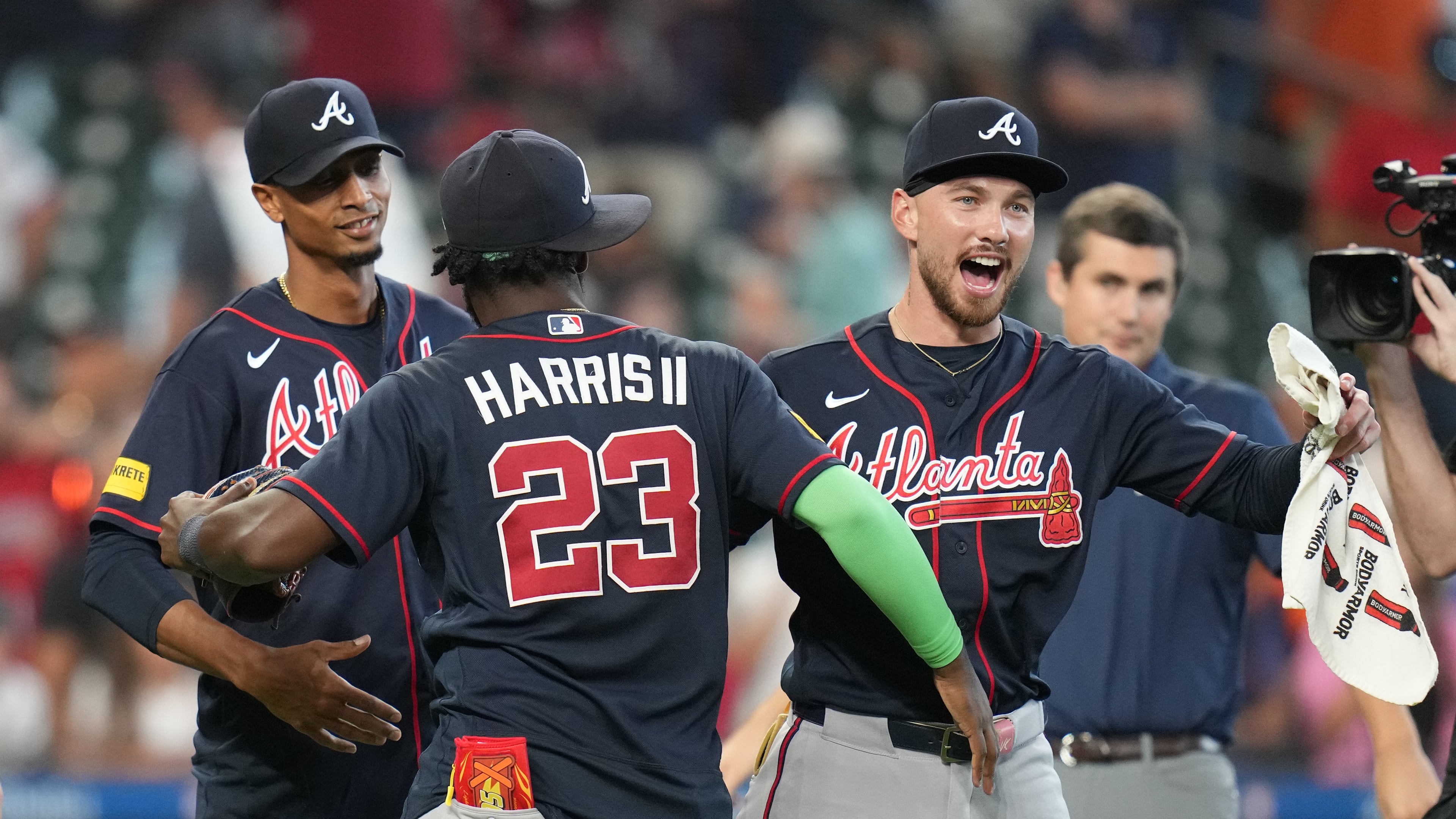 Atlanta Braves' Michael Harris II (23) and DaShawn Keirsey Jr., front right, celebrate on the field after a baseball game against the Houston Astros as they clinched the NL East title, Sunday, Sept. 20, 2026, in Houston. (AP Photo/Karen Warren)