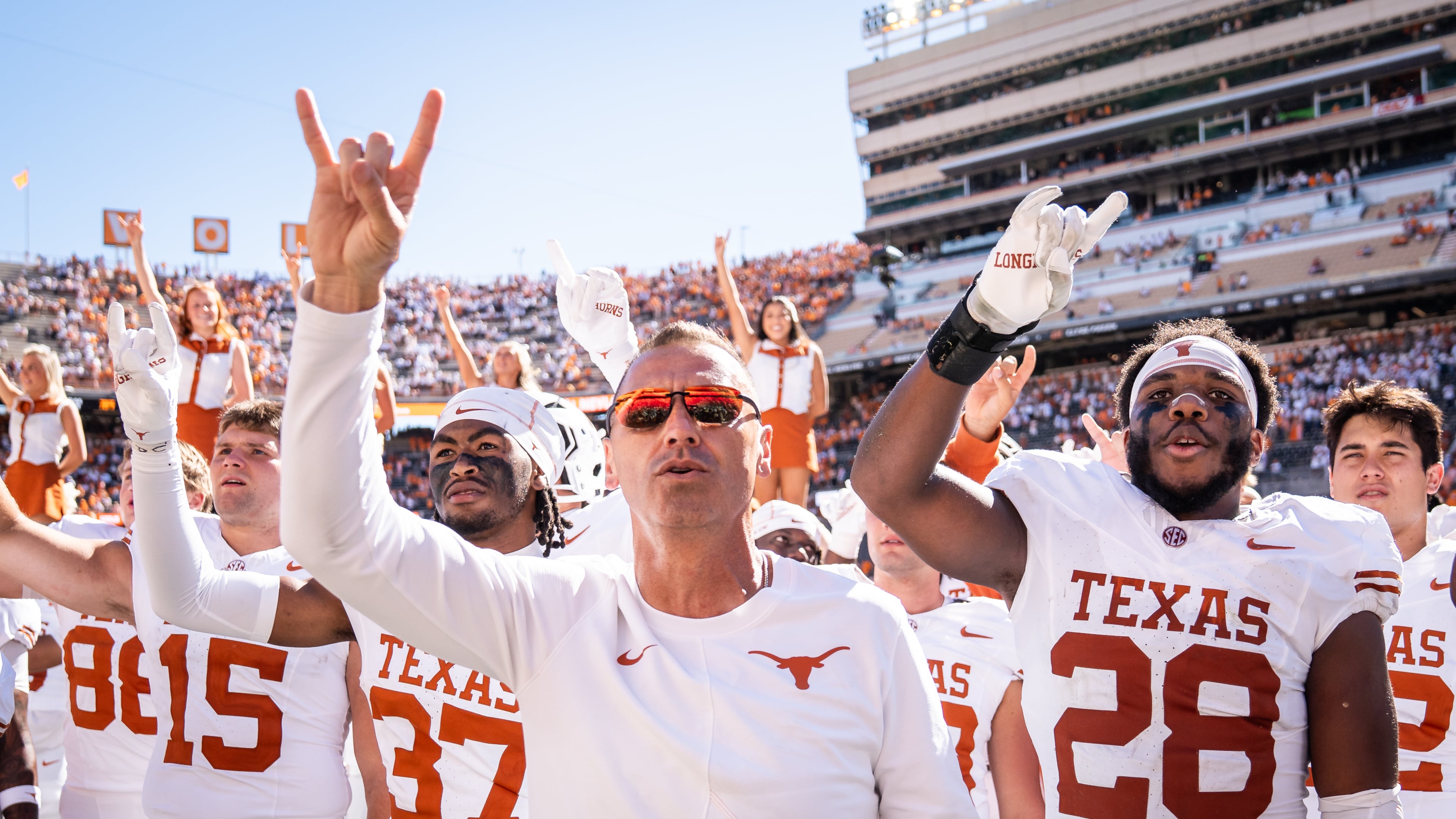 Texas head coach Steve Sarkisian sings "The Eyes of Texas" with the team after an NCAA college football game against Tennessee in Knoxville, Tenn., Saturday, Sept. 26, 2026. (Sara Diggins/The San Antonio Express-News via AP)
