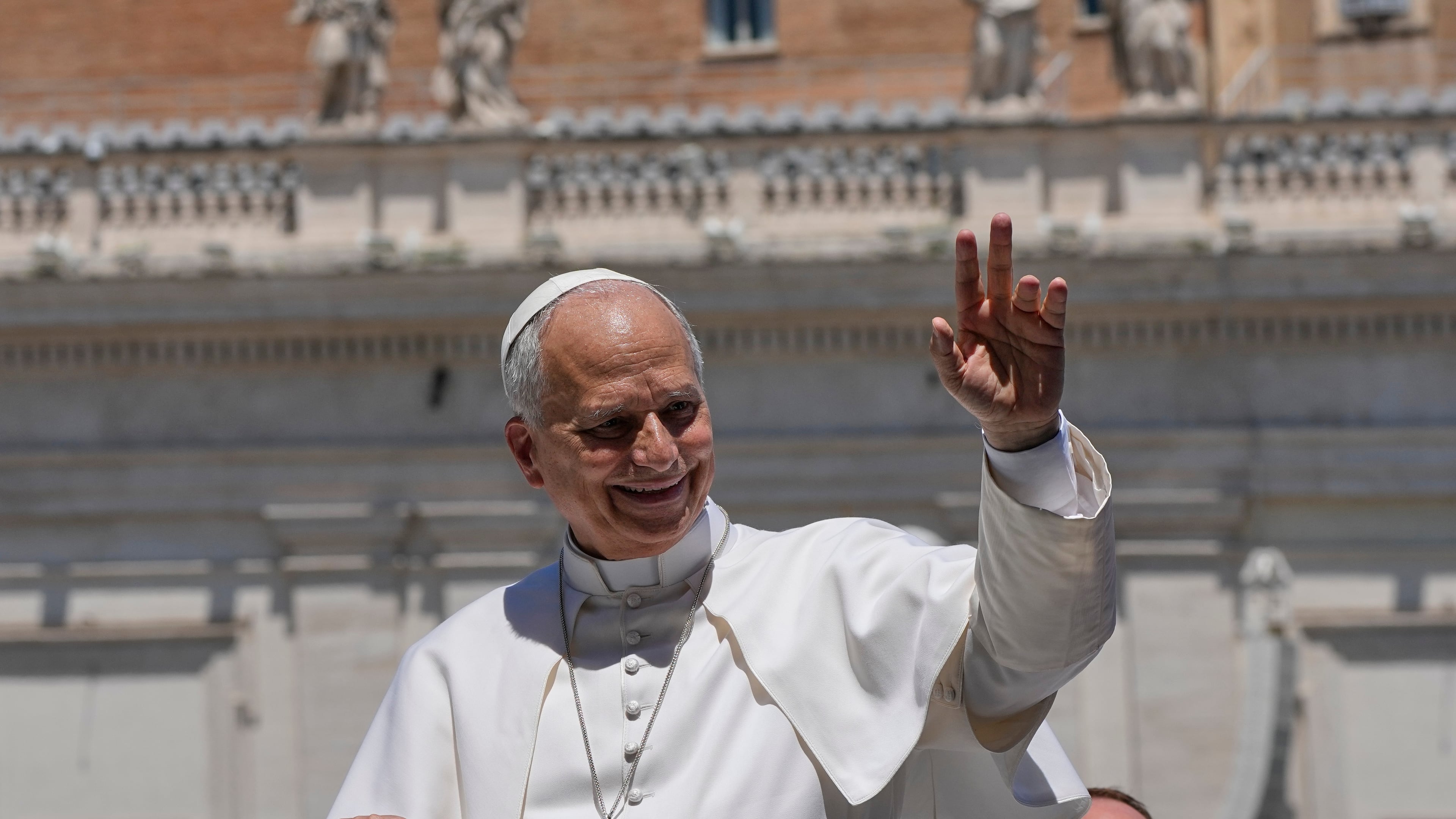 Pope Leo XIV waves as he leaves after his weekly general audience in St. Peter's Square at The Vatican, Wednesday, May 27, 2026. (AP Photo/Alessandra Tarantino)