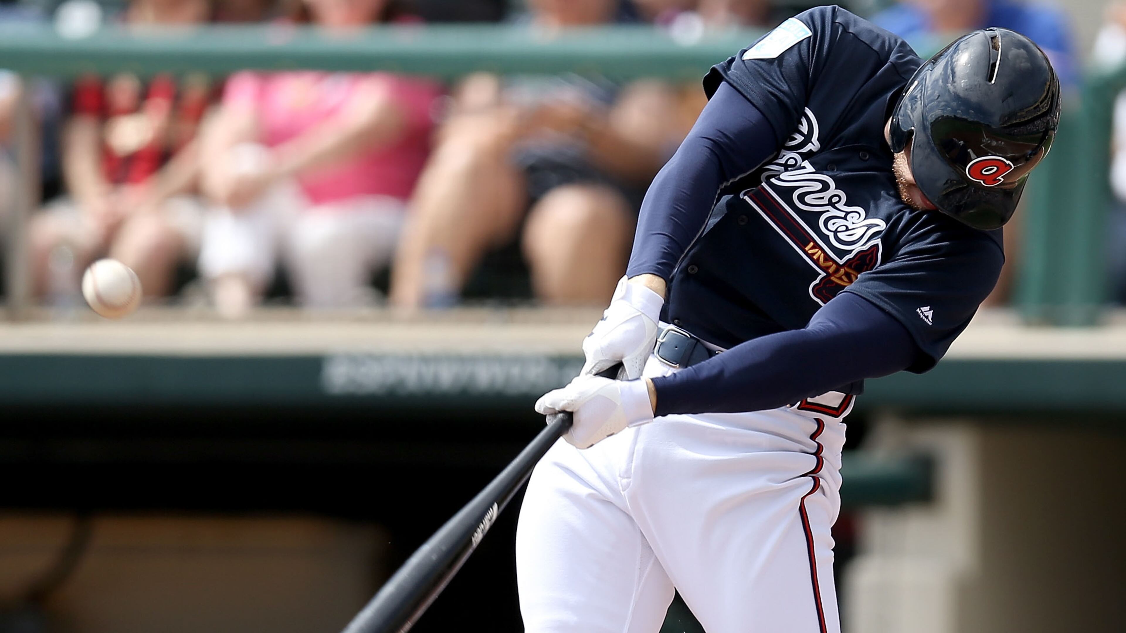 Braves' first baseman Freddie Freeman hits a double in the first inning Sunday, March 3, 2019, against the Miami Marlins at Champion Stadium in Lake Buena Vista, Fla.