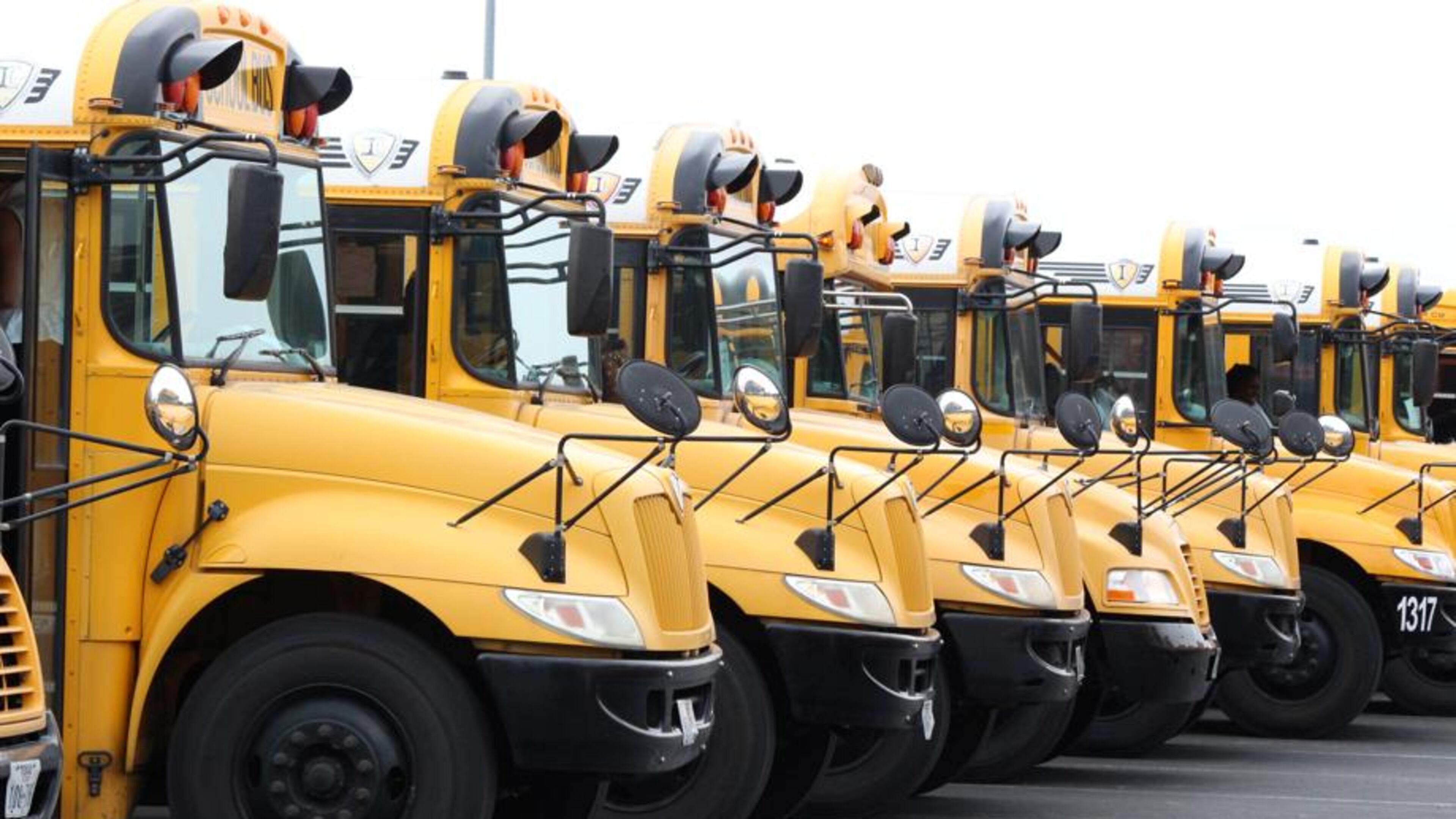Initial afternoon school bus delays of up to 35 minutes should disappear by the third week of school, Forsyth County School District officials say. AJC FILE