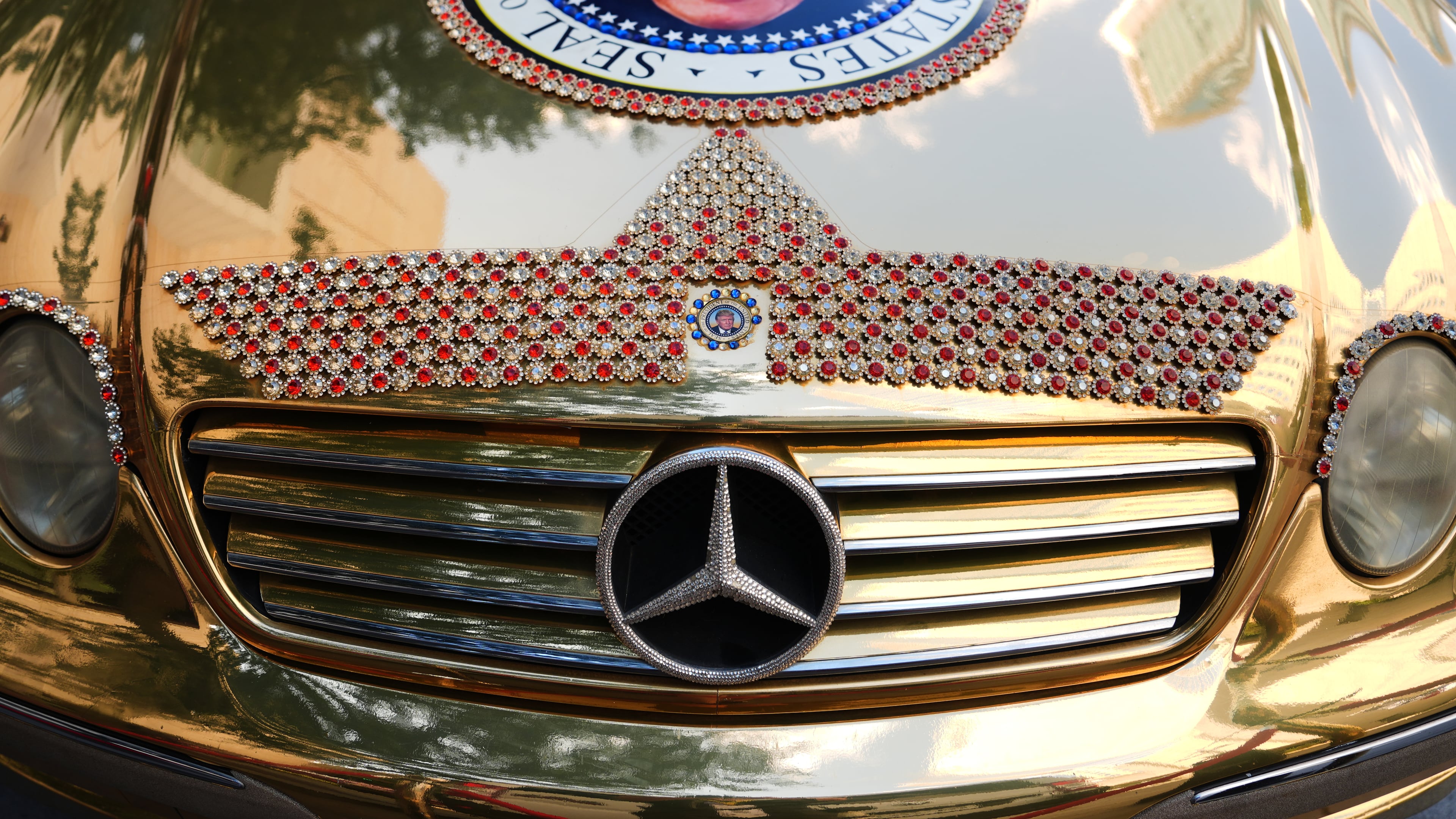 A Mercedes decorated with images of President Donald Trump is seen outside before the Republican convention Tuesday, Sept. 8, 2026, in Dallas. (AP Photo/Julia Demaree Nikhinson)