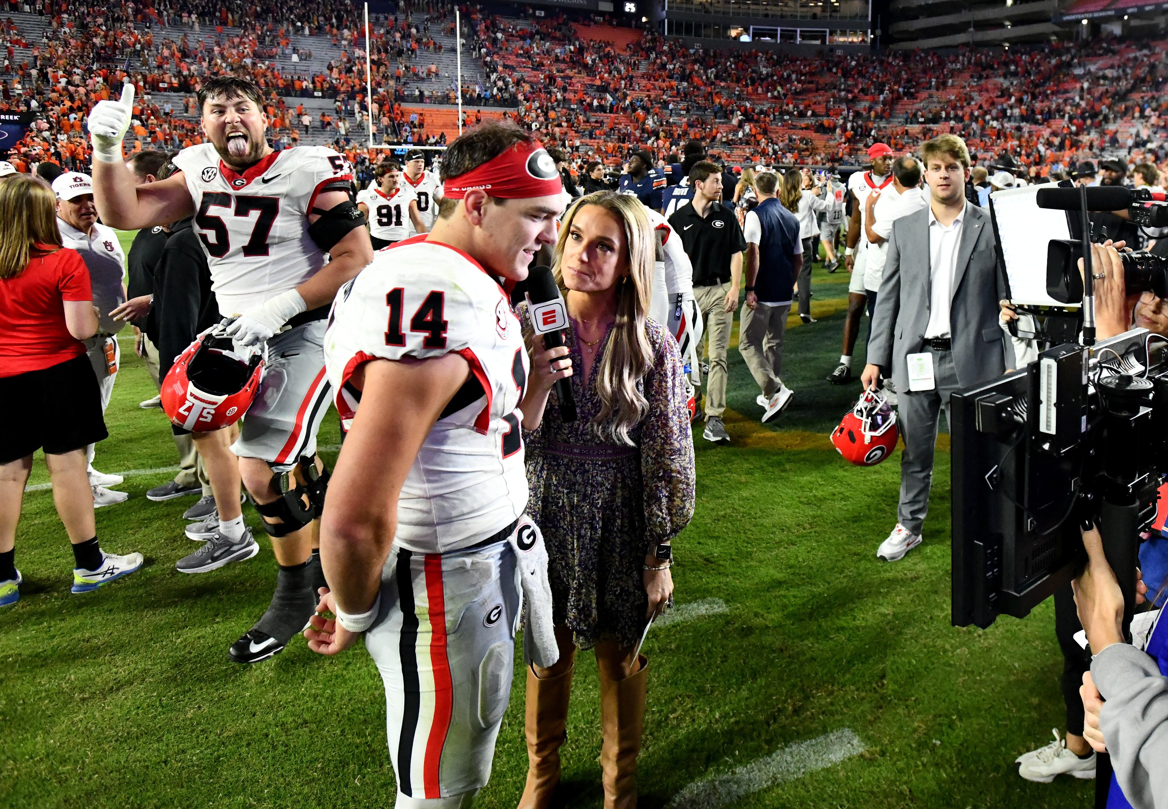 Georgia quarterback Gunner Stockton (14) is interviewed after Georgia beat Auburn during a NCAA college football game at Jordan-Hare Stadium, Saturday, October 11, 2025, in Auburn, Ala. Georgia won 20-10 overAuburn. (Hyosub Shin / AJC)