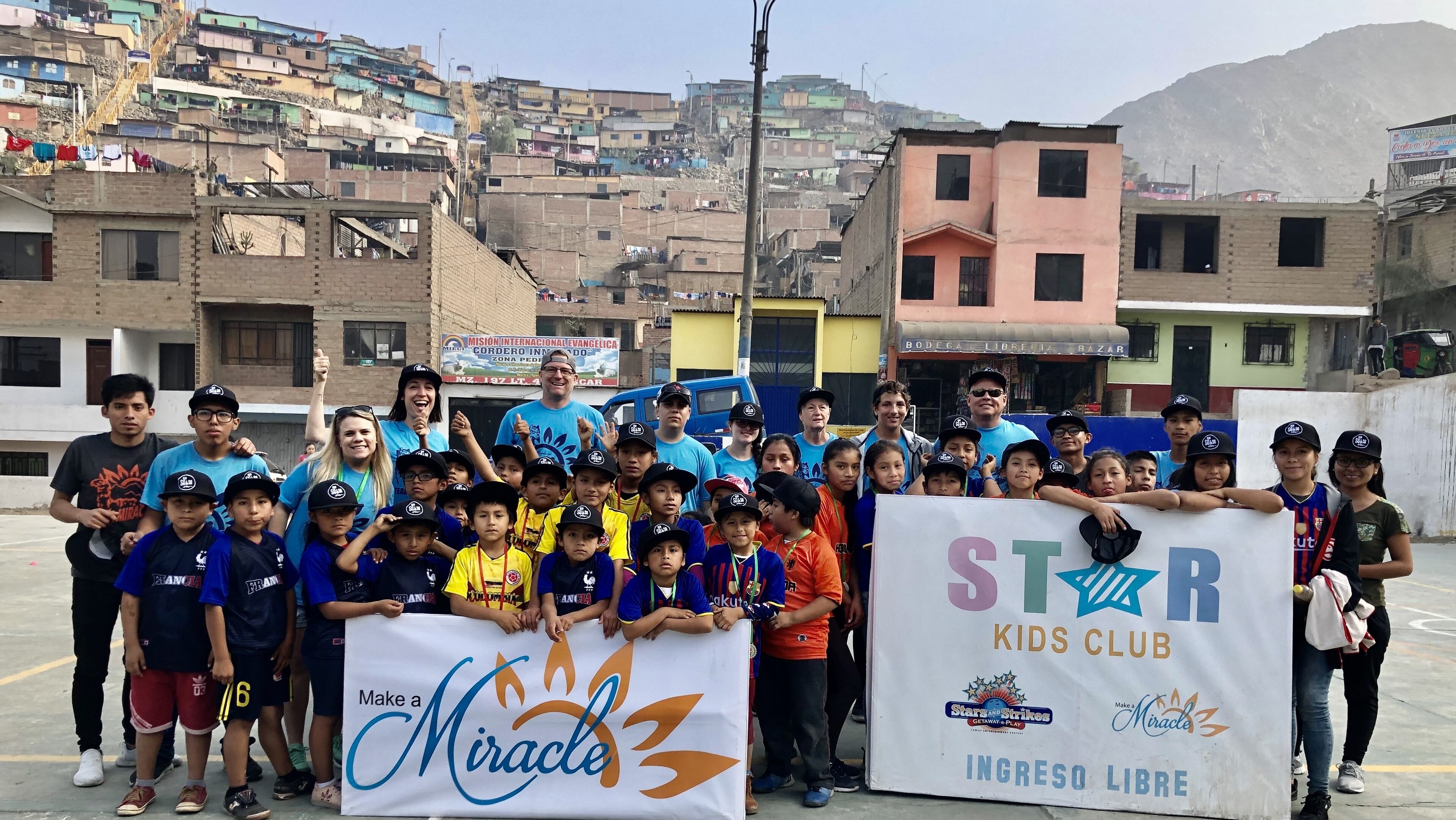 Make a Miracle also sponsors Star Kids Clubs. More than 130 children from San Juan de Lurigancho, Lima, Peru, have participated in clubs with games, teaching and worship. The scholarship students are volunteer helpers. Courtesy of Make a Miracle.