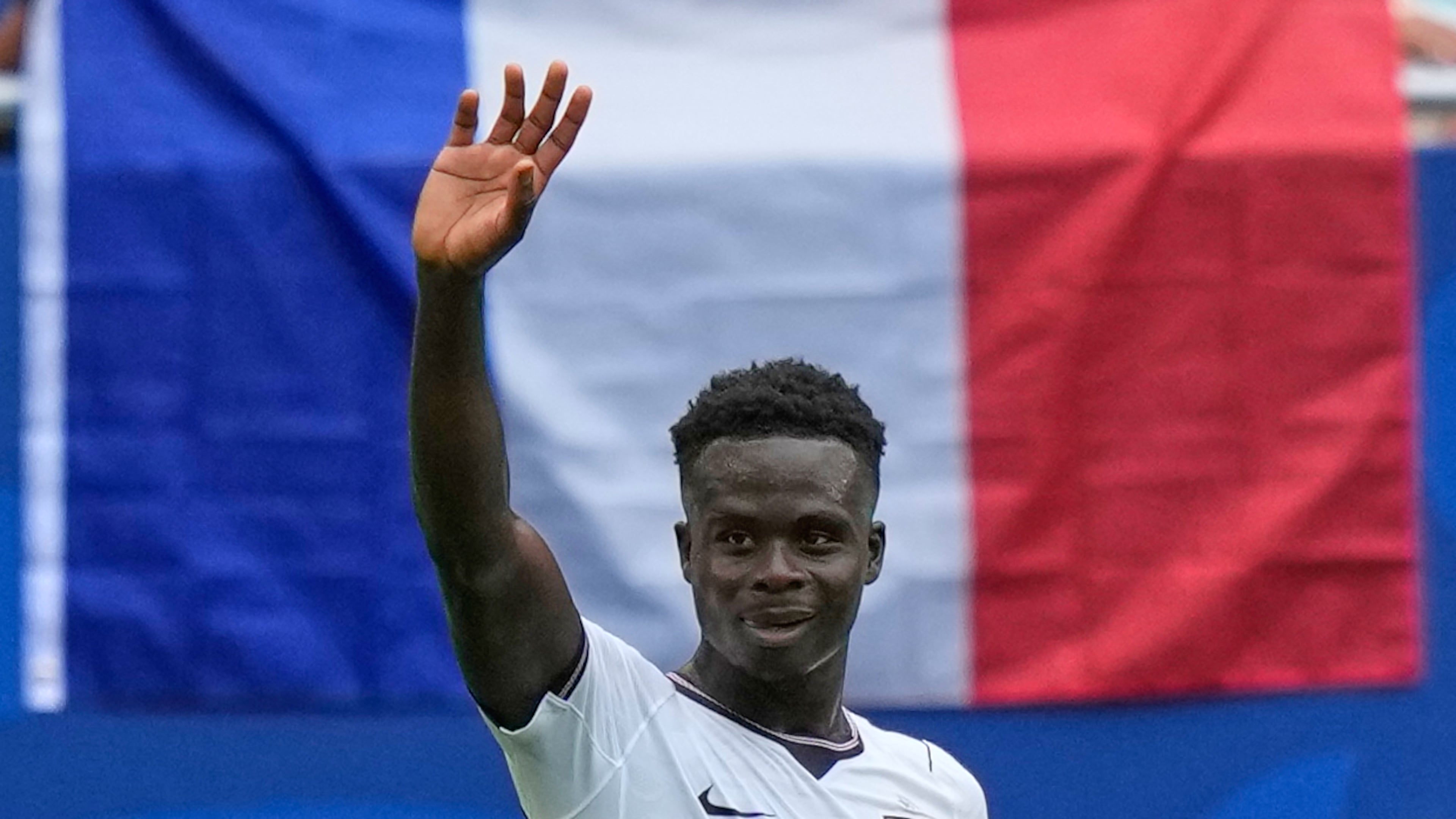 England's Bukayo Saka (7) celebrates scoring their fourth goal during the World Cup third-place playoff soccer match between France and England in Miami Gardens, Fla., Saturday, July 18, 2026. (AP Photo/Lynne Sladky)
