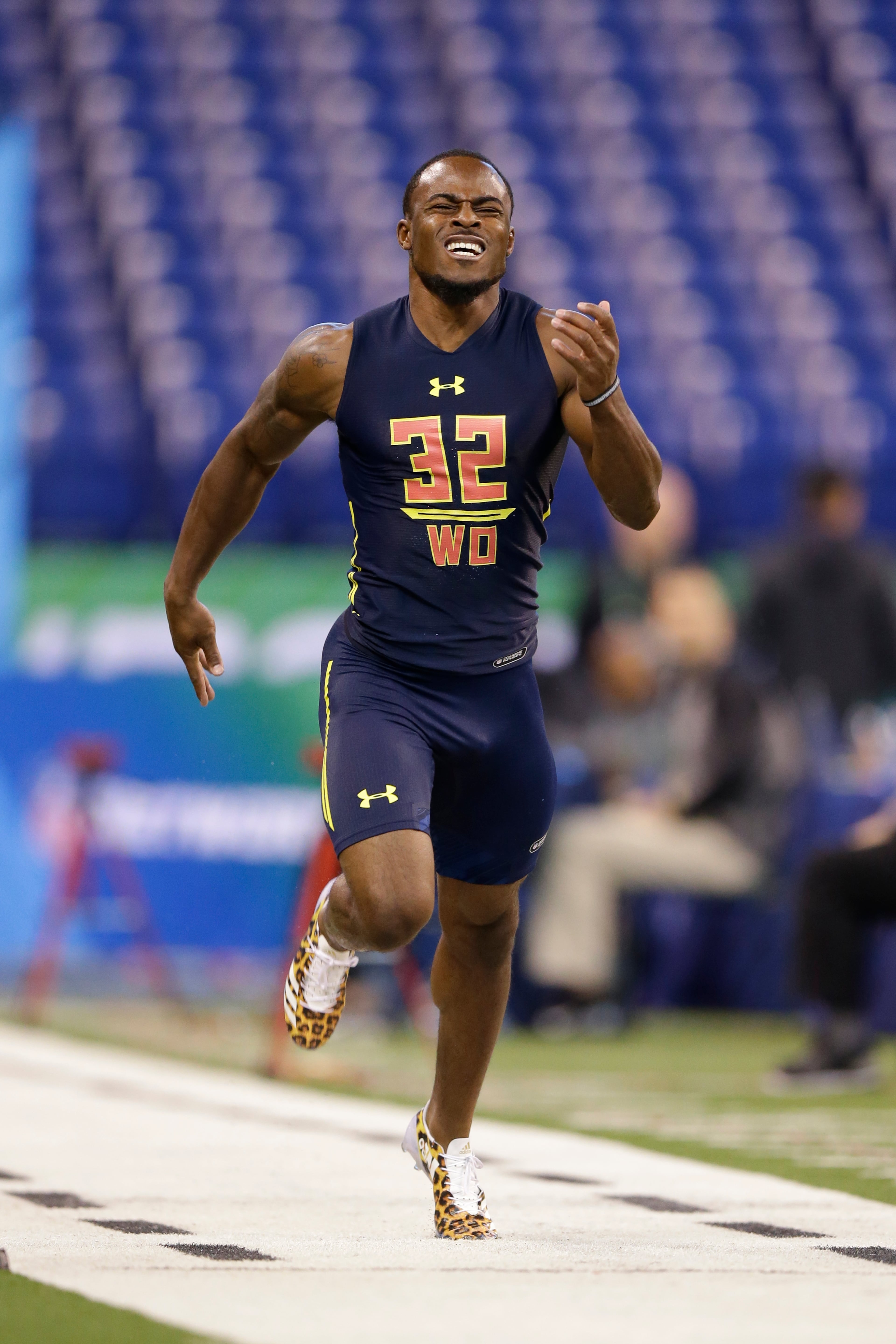 Georgia wide receiver Isaiah Mckenzie runs the 40-yard dash at the NFL football scouting combine in Indianapolis, Saturday, March 4, 2017. (AP Photo/Michael Conroy)