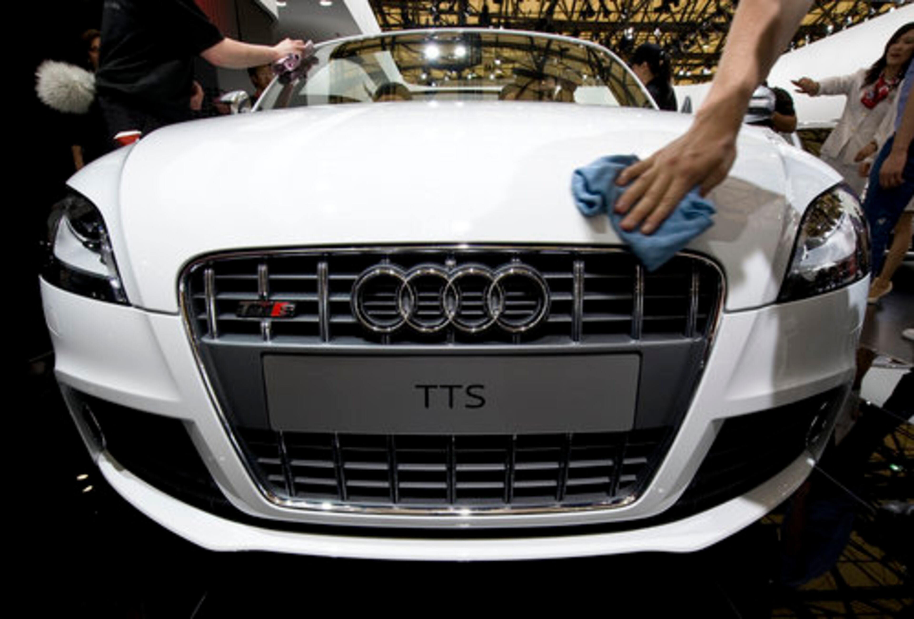 Workers polish an Audi TTS.