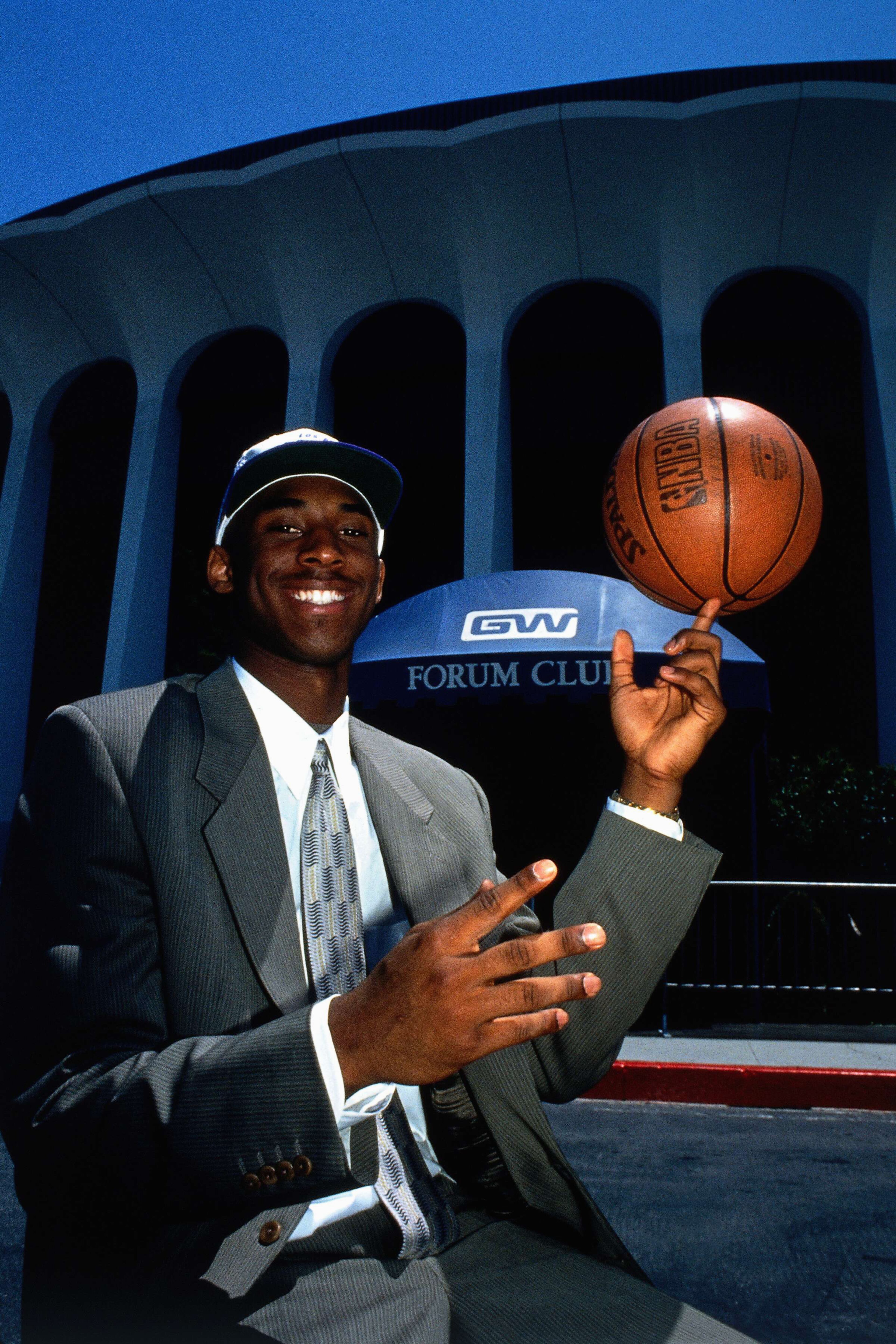 INGLEWOOD, CA - JULY 12: Kobe Bryant #8 of the Los Angeles Lakers poses for a photo at a press conference on July 12, 1997 at the Great Western Forum in Inglewood, California. NOTE TO USER: User expressly acknowledges and agrees that, by downloading and or using this photograph, User is consenting to the terms and conditions of the Getty Images License Agreement. (Photo by Jon Soohoo/ NBAE via Getty Images)