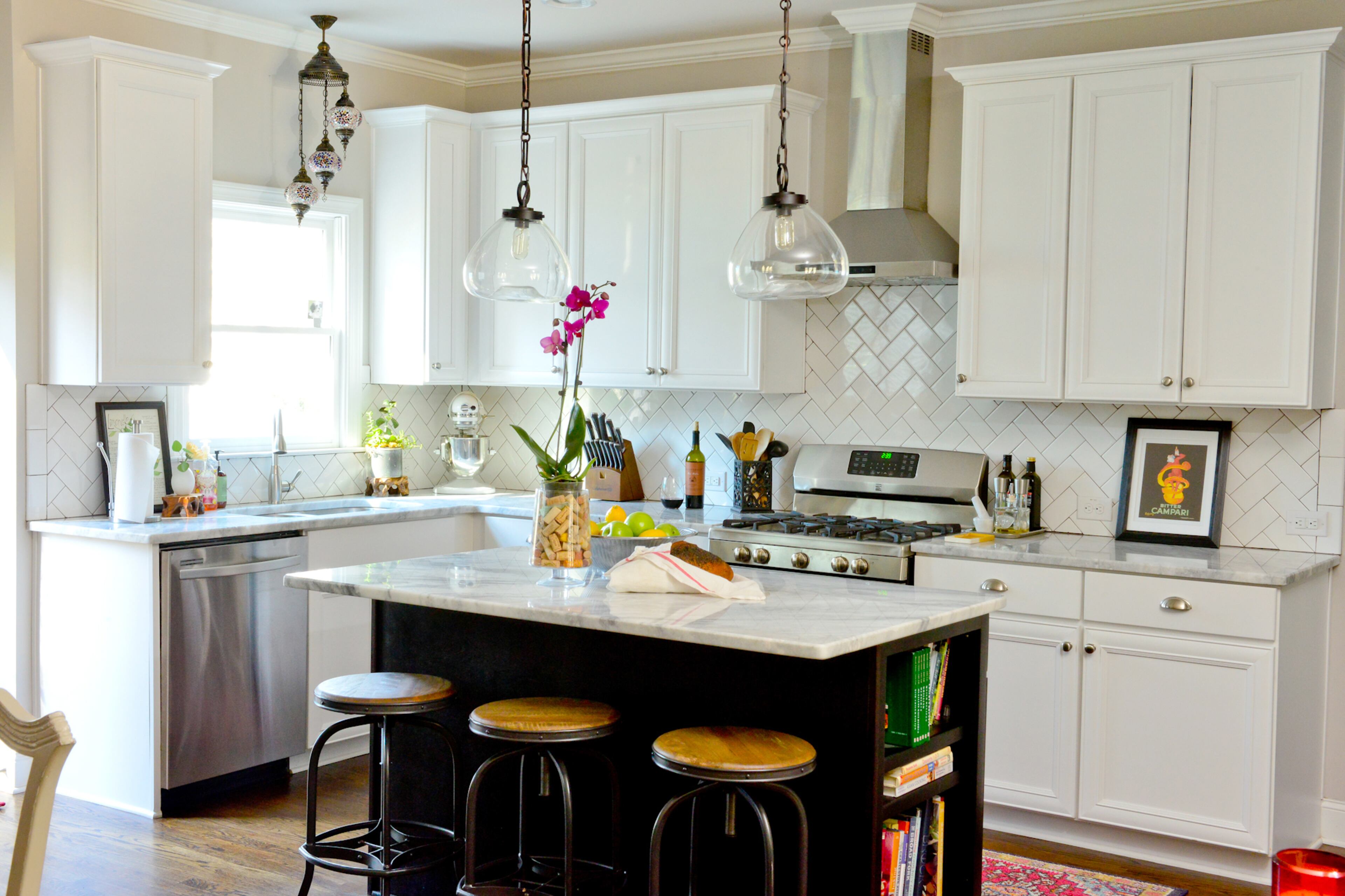 Homeowner Jennifer Franklin loves the open concept in her Atlanta kitchen, as well as the window over the sink that looks out into the backyard. Kenmore stainless steel appliances, Mont Blanc marble counters and a large espresso-colored island with seating and storage for cookbooks provide an ideal space for the Franklins to cook and entertain guests at the same time. Text by Lori Johnston and Keith Still/Fast Copy News Service.