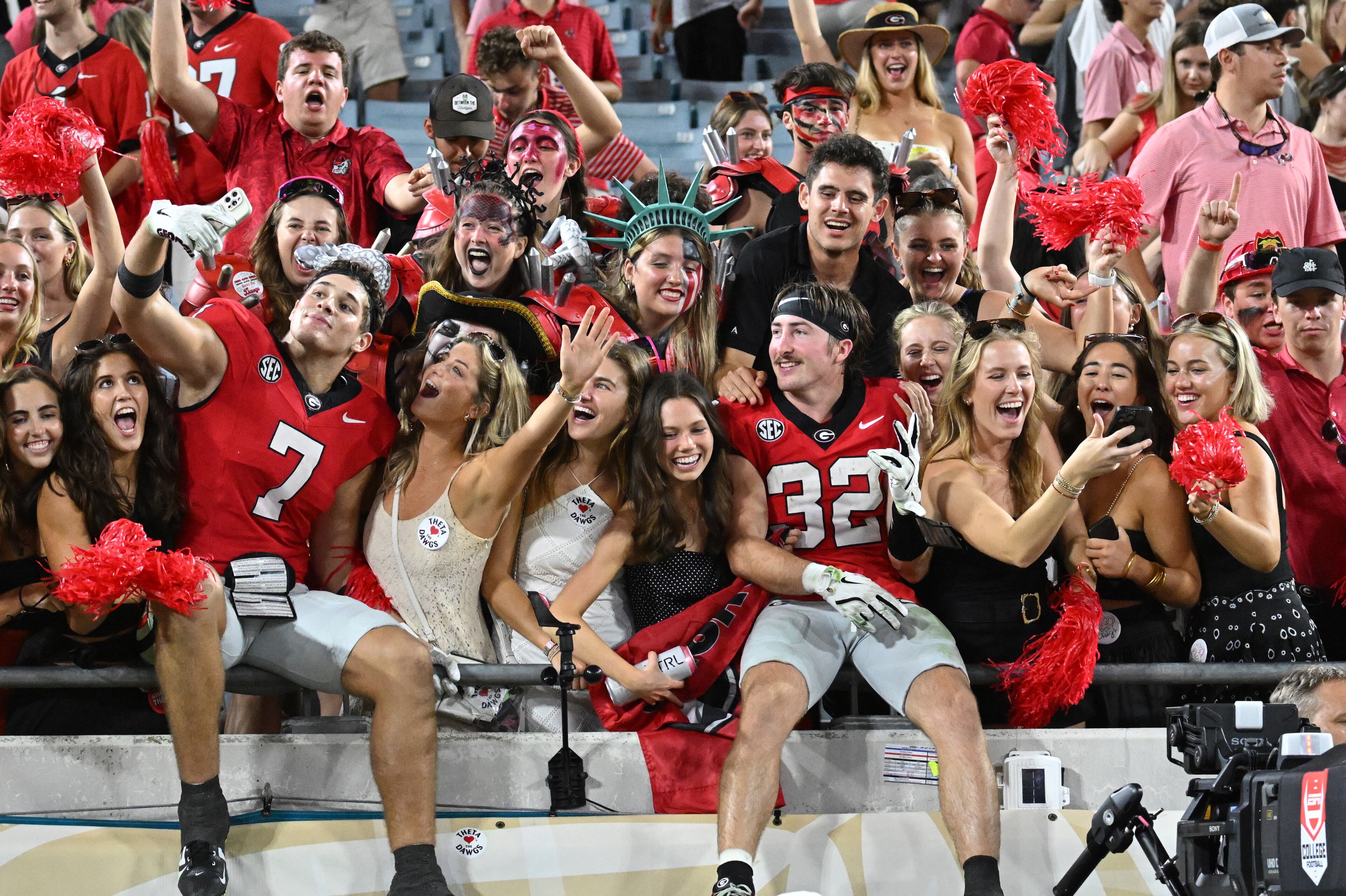Georgia players and fans celebrate after Georgia beat Florida during the NCAA football game at EverBank Stadium, Saturday, November 2, 2024, in Jacksonville, Fla. Georgia won 34-20 over Florida. (Hyosub Shin / AJC)