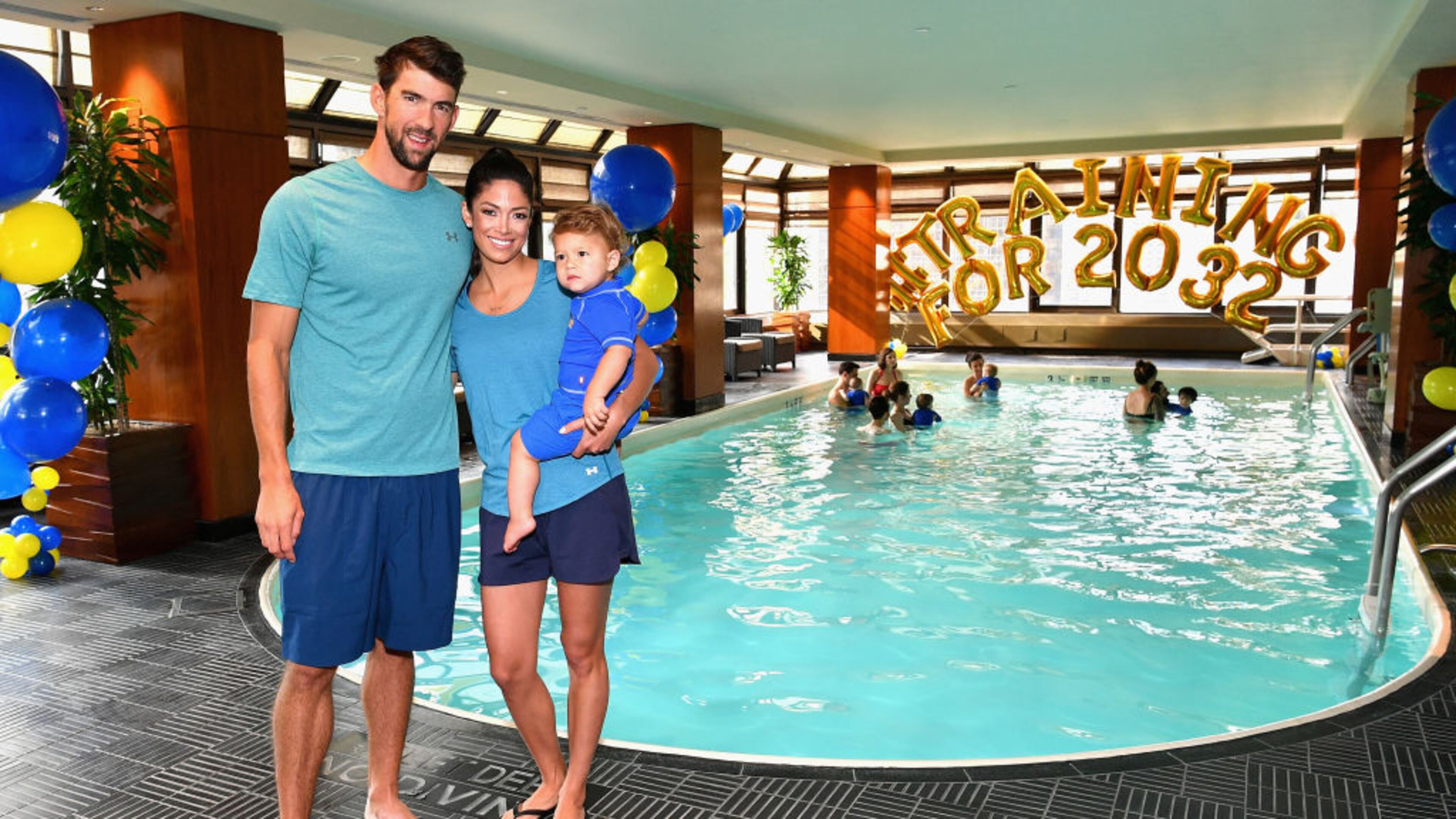 NEW YORK, NY - AUGUST 21: Michael Phelps, Nicole Phelps and Boomer Phelps attendthe Huggies Little Swimmers #trainingfor2032 Swim Class With The Phelps Foundation on August 21, 2017 in New York City. (Photo by Dia Dipasupil/Getty Images for Huggies)