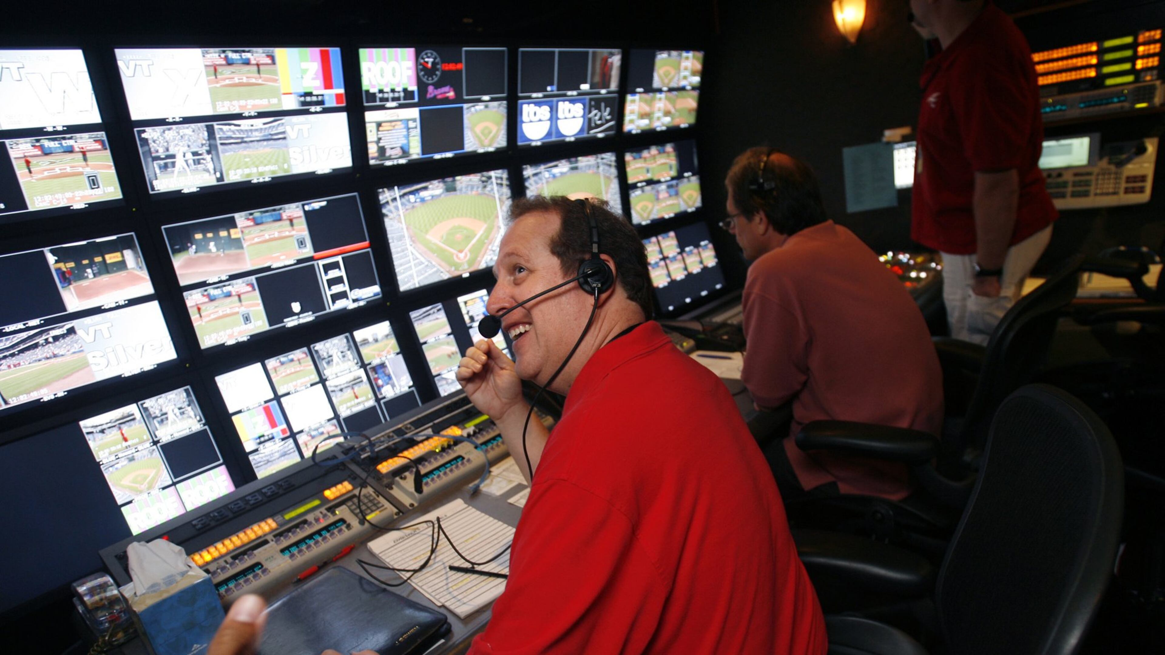 Former TBS baseball producer Glenn Diamond seated in the production booth. Diamond oversaw Braves broadcasts for 31 years, including the world championship season of 1995, before leaving for a similar job with the Los Angeles Dodgers. (Contributed photo)