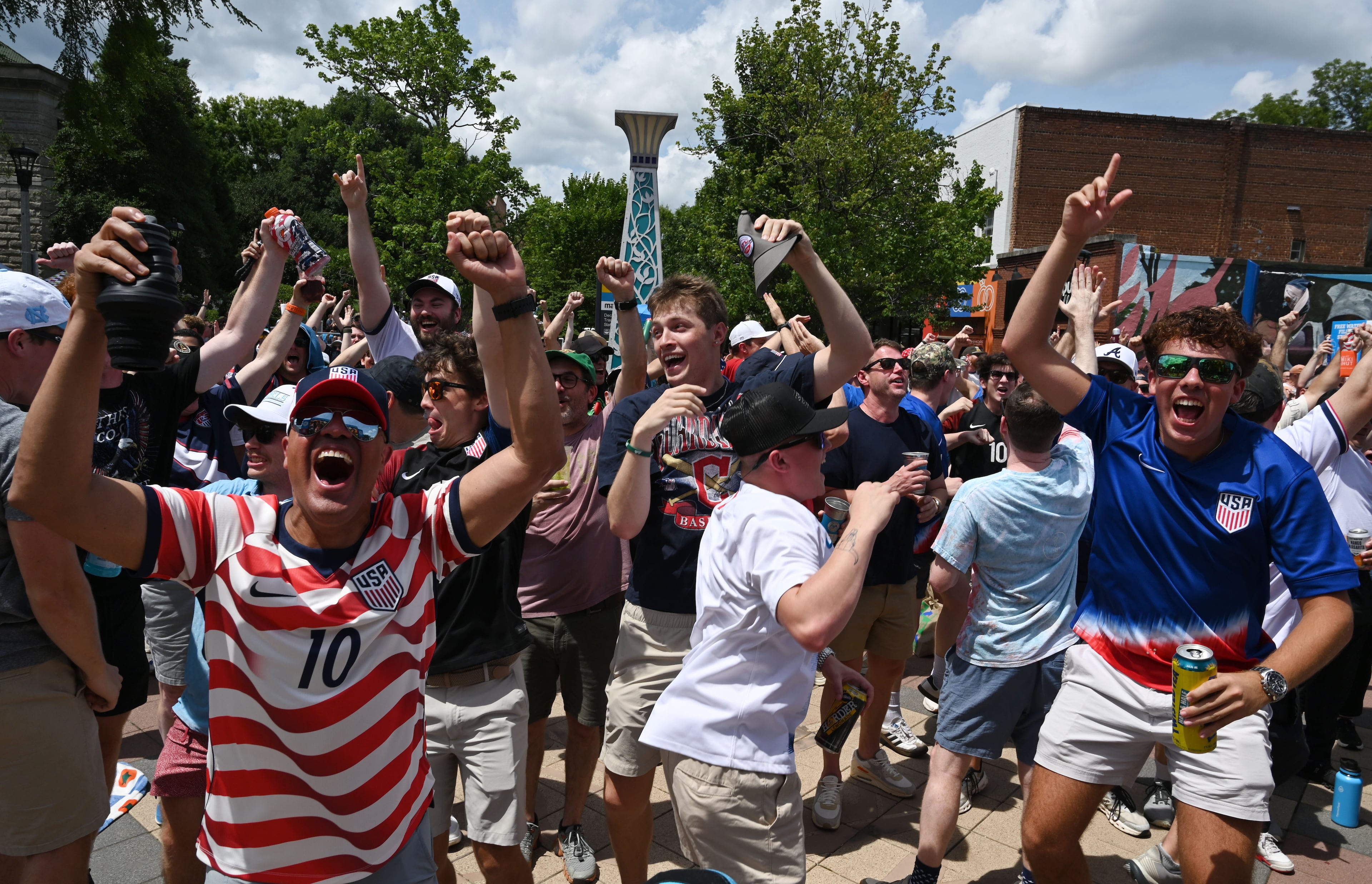 Soccer fans react as Team USA scores against Australia during Decatur WatchFest at Decatur Square on Friday, June 19, 2026. (Hyosub Shin/AJC)