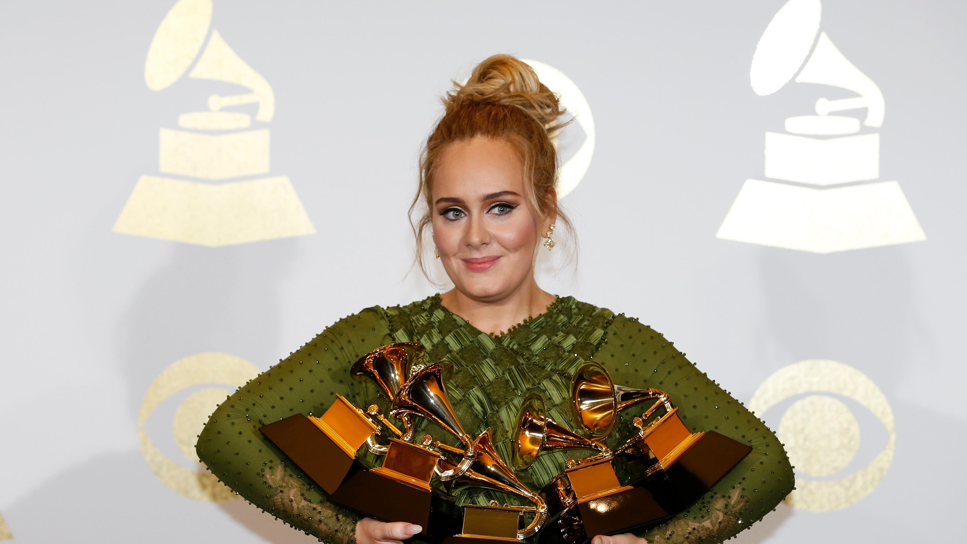 Adele and her armload of Grammys. (Allen J. Schaben/Los Angeles Times/TNS)