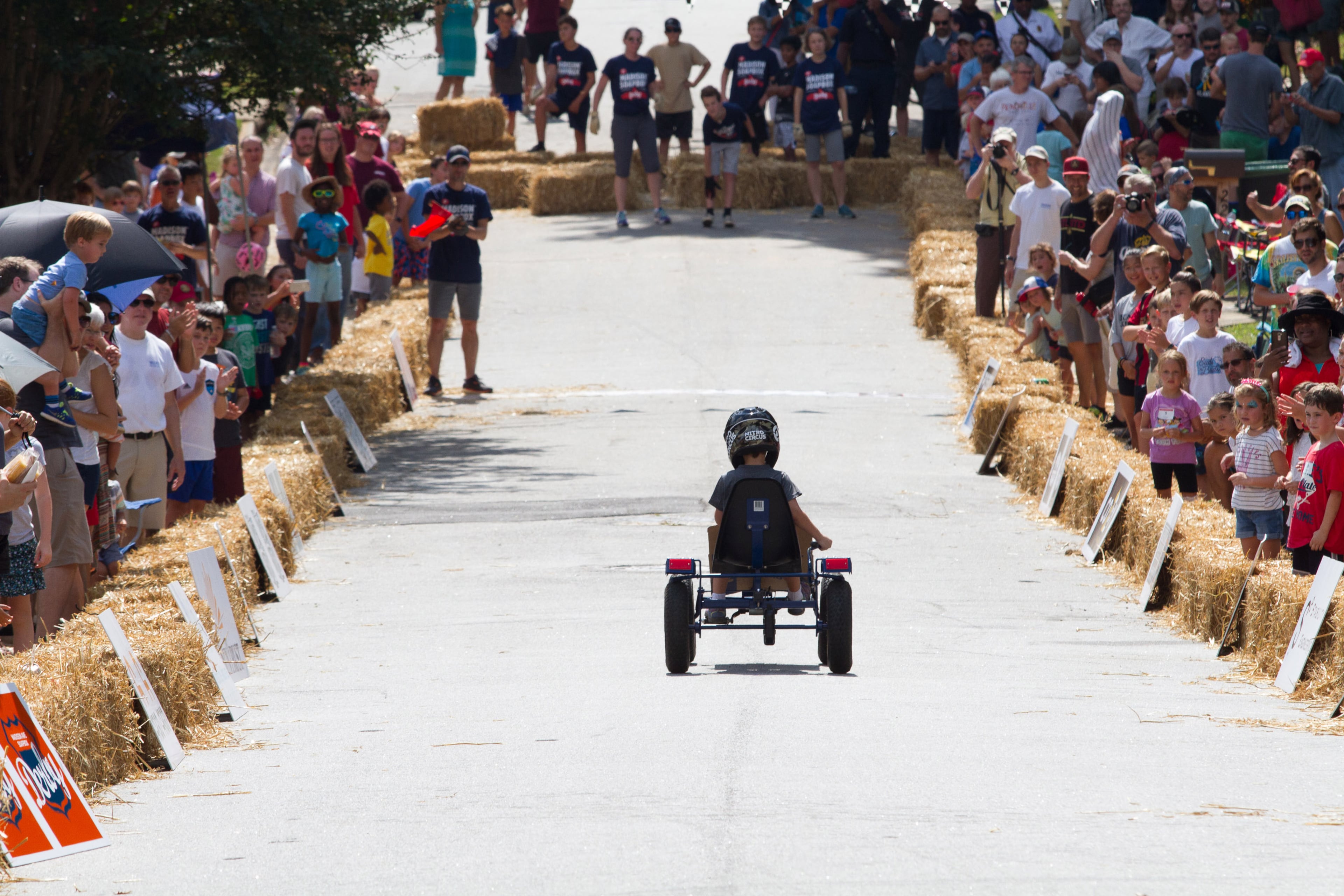 A soapbox derby car heads down Madison Ave. in Decatur GA Saturday during the 8th Annual Madison Avenue Soapbox Derby, October 6, 2018. Started in 2011 the Madison Avenue Soapbox Derby has raised nearly $130,000 for local charities. STEVE SCHAEFER / SPECIAL TO THE AJC