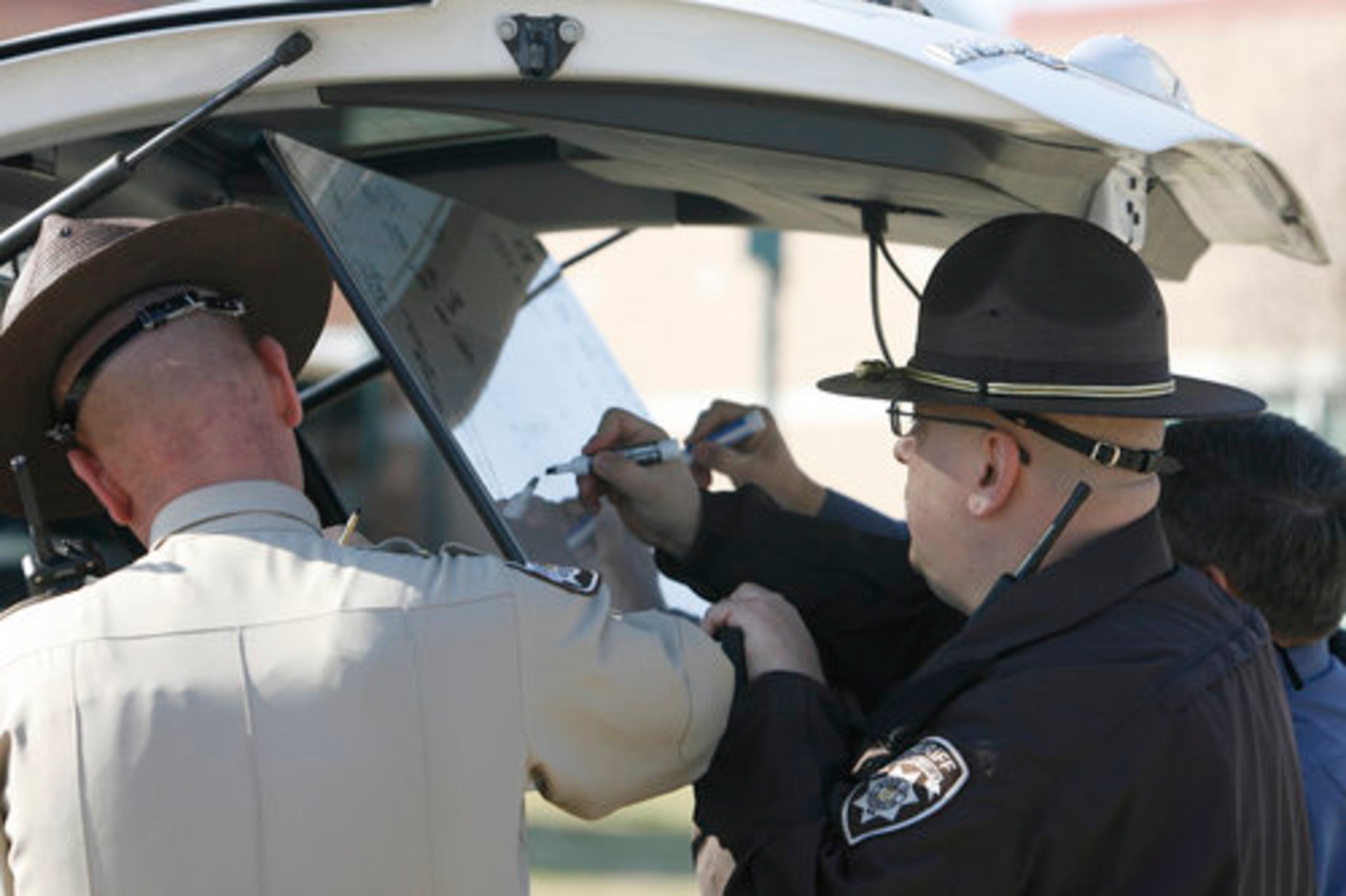 Holly Springs police got a tip that two or three students would be going to Woodstock High School Thursday armed with a handgun and two assault rifles, along with 180 rounds of ammunition, according to Sgt. Jay Baker of the Cherokee Sheriff's Department.